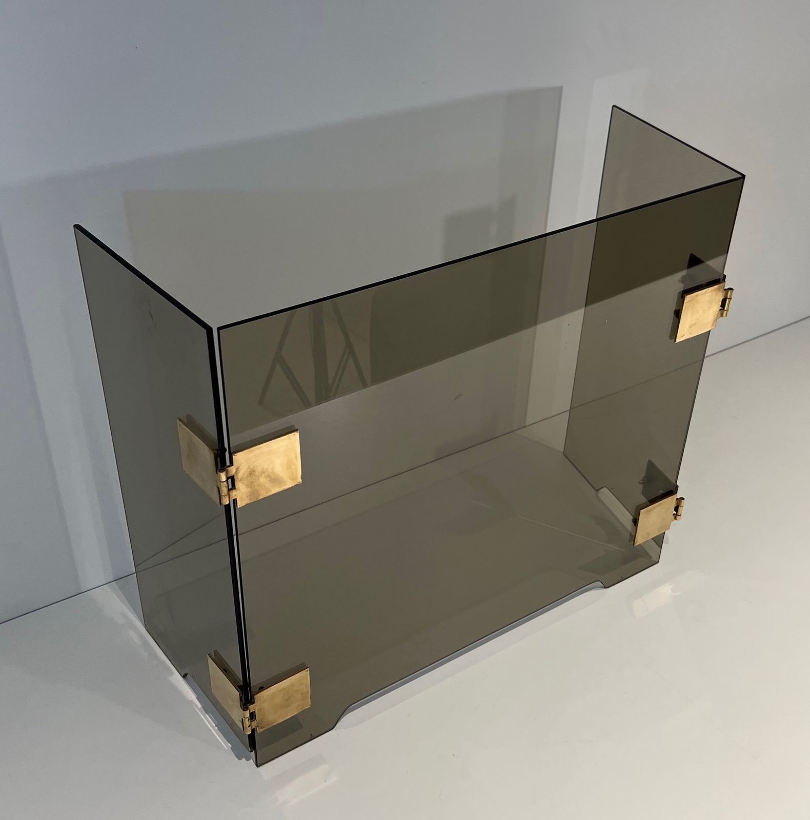 Tri Fold Firewall In Smoked Glass And Brass. Around 1970