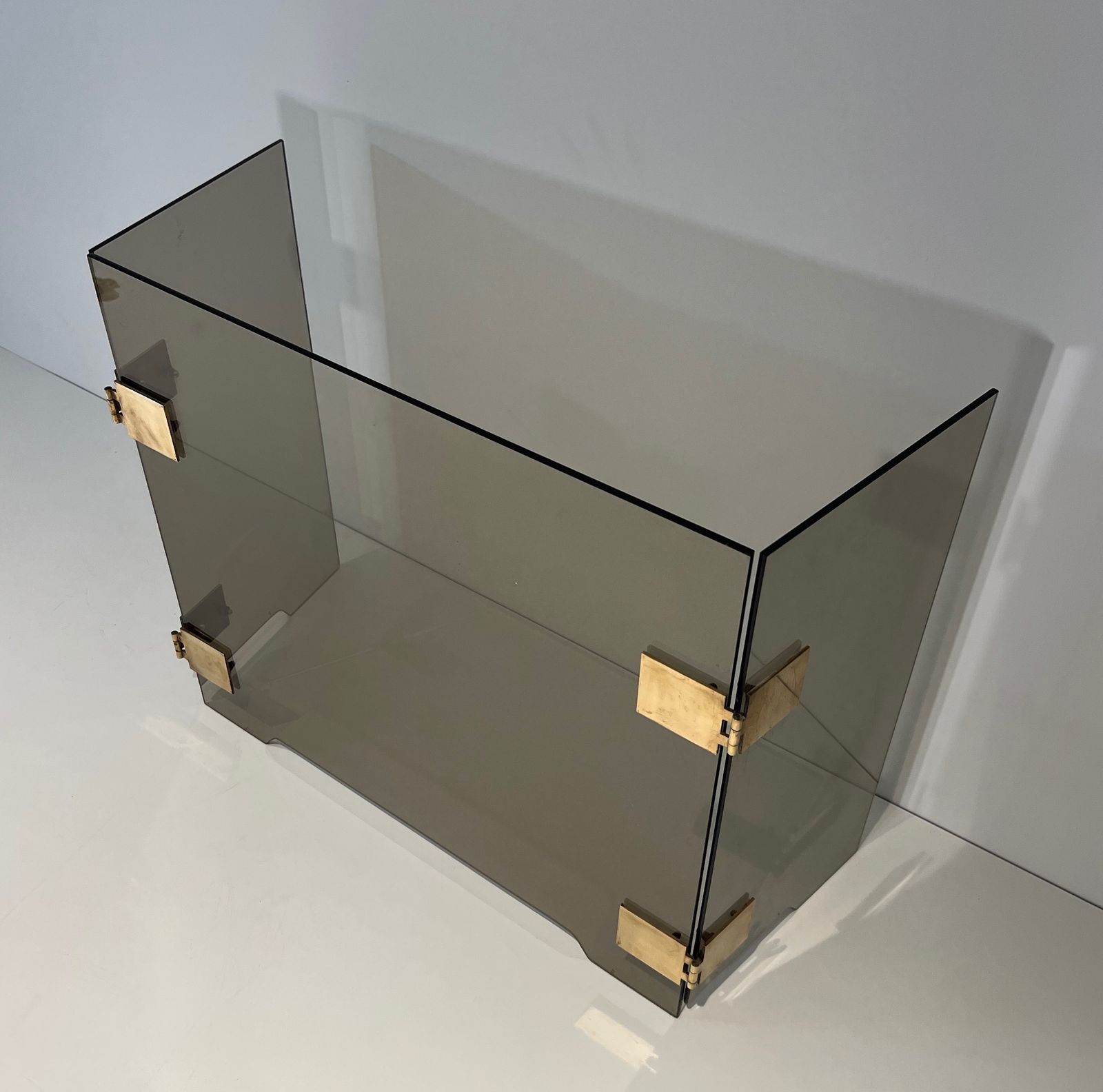 1250.0 Tri Fold Firewall In Smoked Glass And Brass. Around 1970 photo