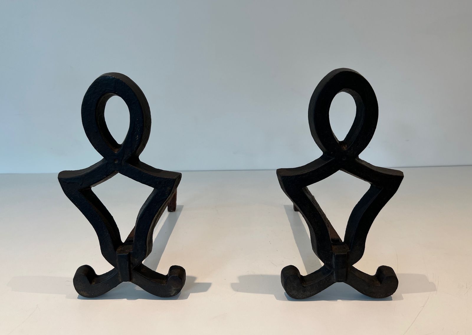 980.0 Pair Of Modernized Cast Iron And Wrought Iron Andirons By Raymond Subes photo