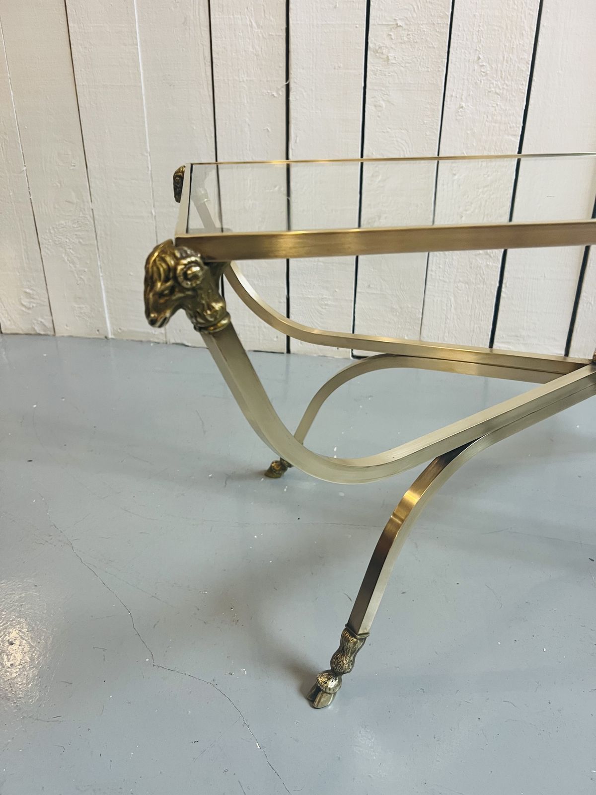 Country House Brass Table Featuring A Ram's Head Design And Hoof photo 1250.0