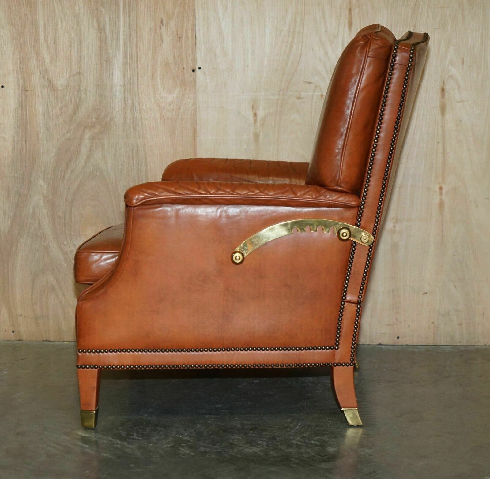 photo buy Comfortable Pair Of French Neoclassical Style Leather & Brass Recliner Armchairs
