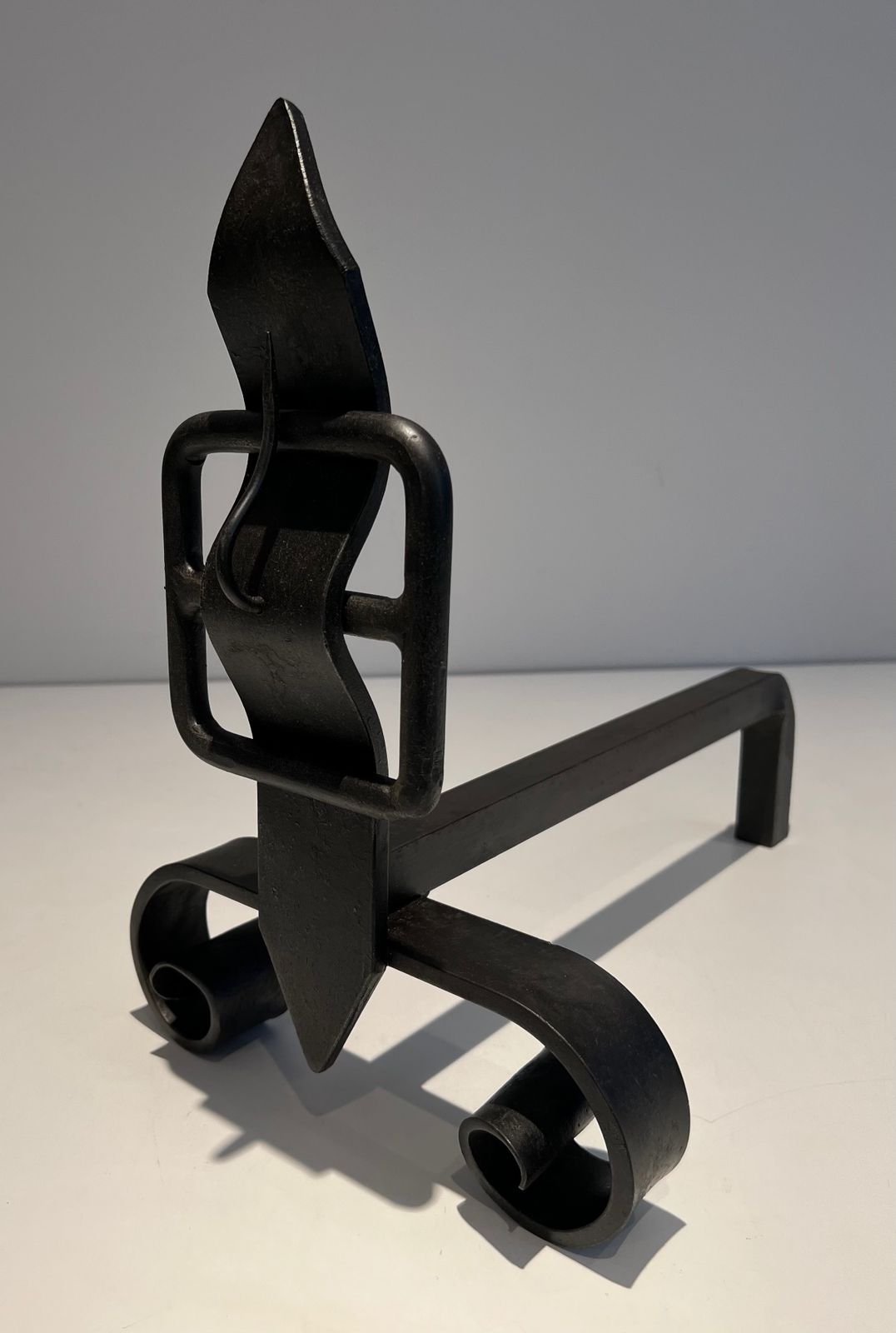 Pair Of Modernist Andirons Representing A Belt photo vintage