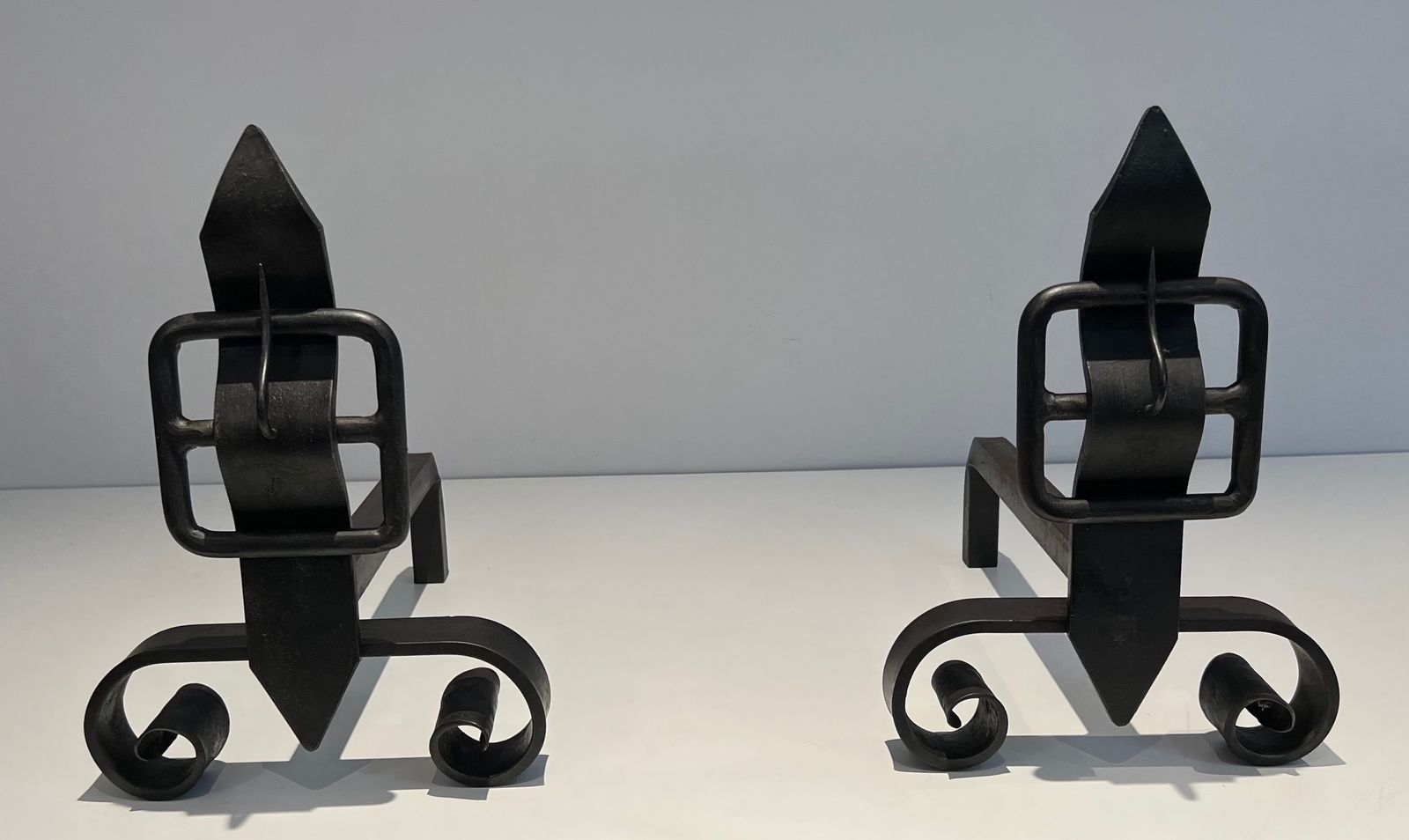 photo vinterior Pair Of Modernist Andirons Representing A Belt