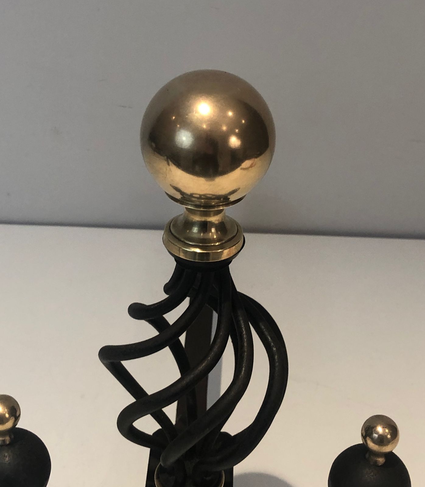 photo for sale Pair Of Wrought Iron Andirons Topped With A Brass Ball