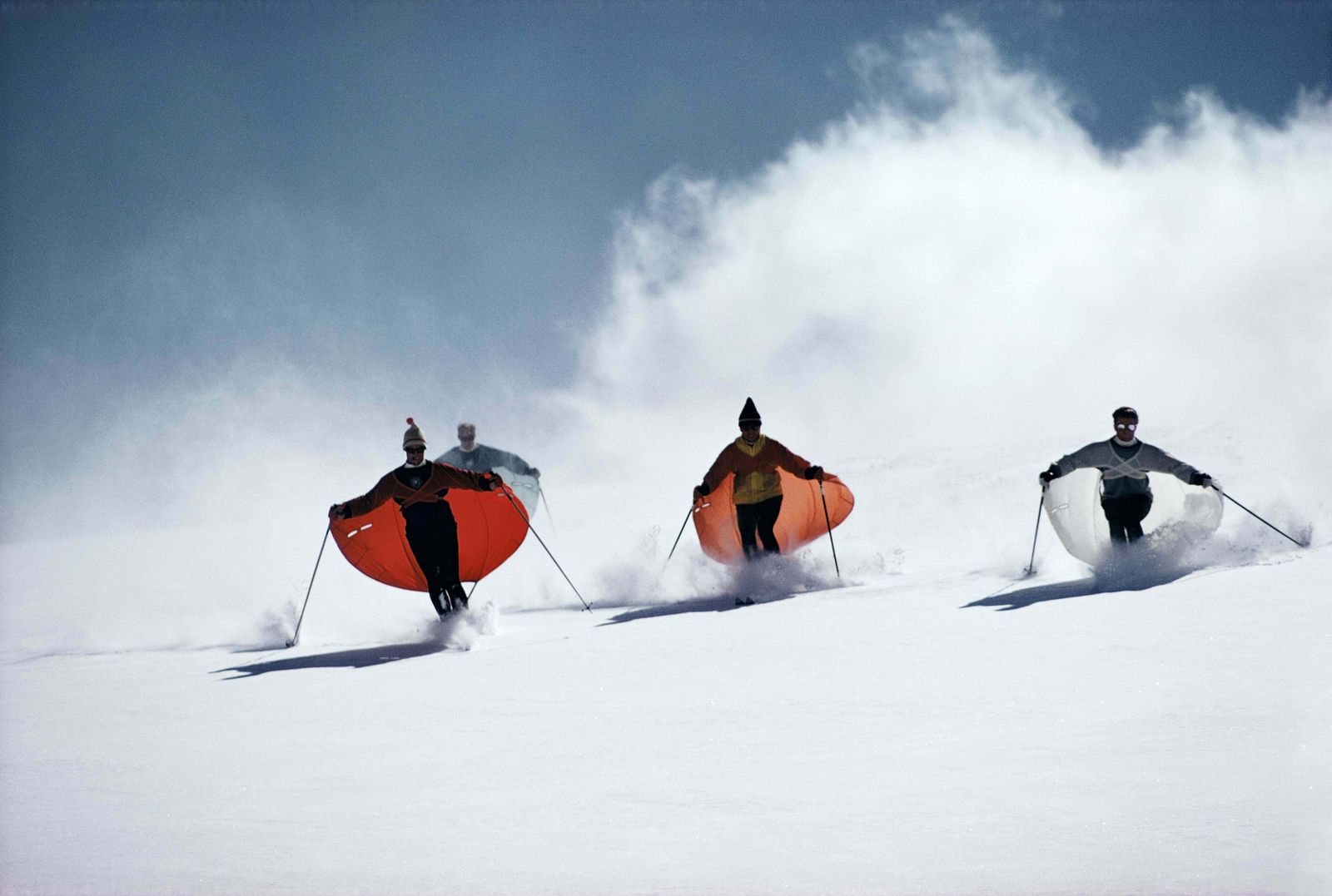 Caped Skiers By Slim Aarons