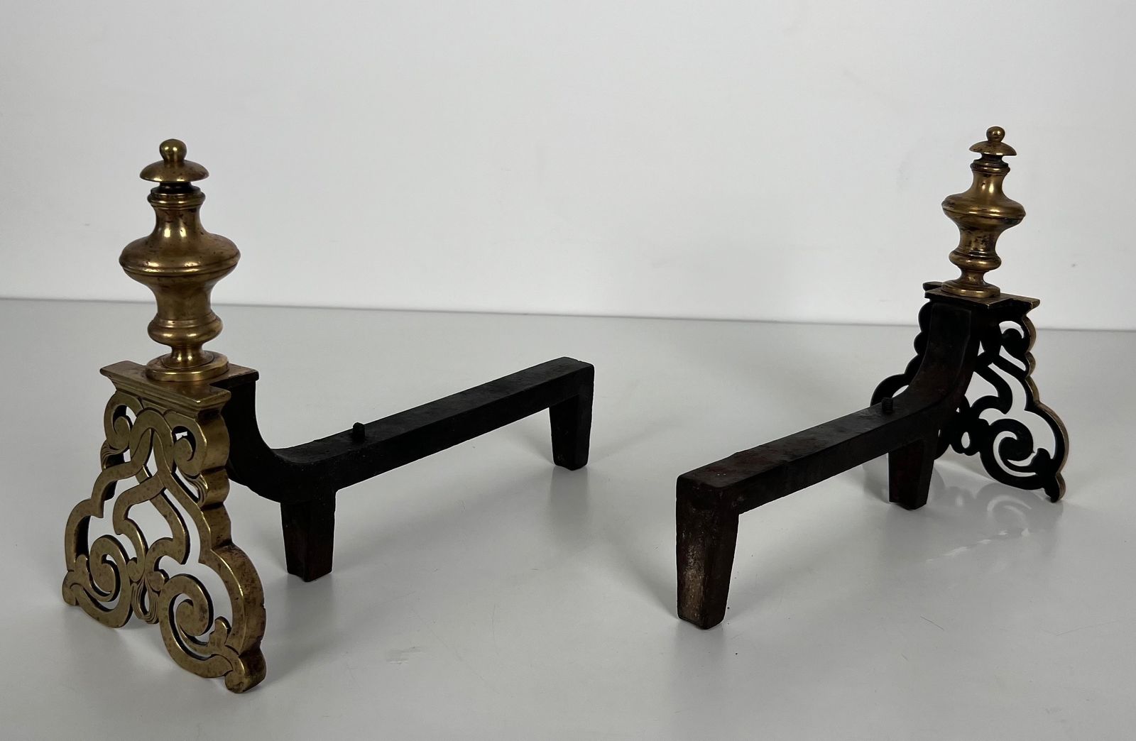Pair Of Chiseled Bronze Andirons. photo buy