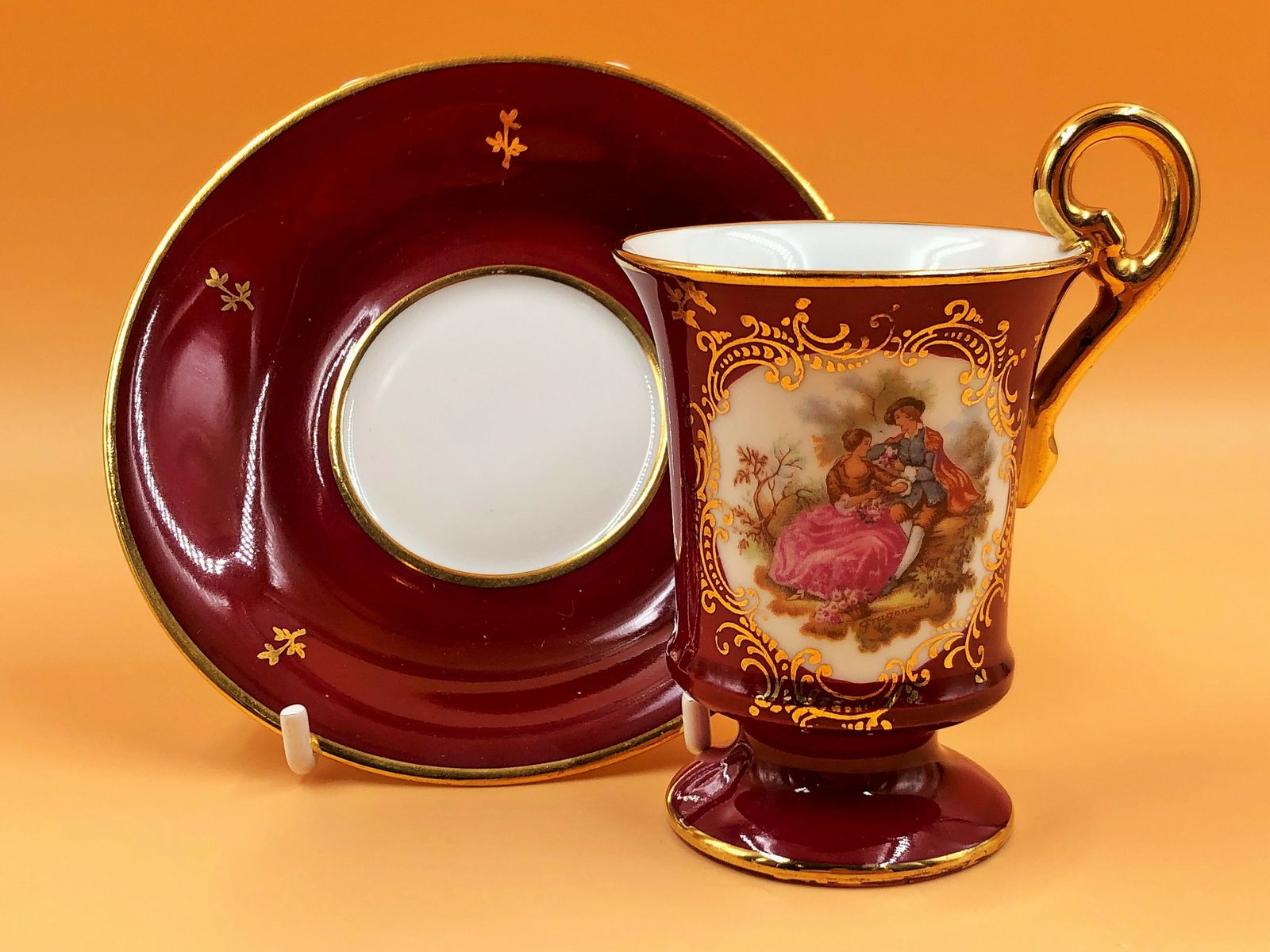 Giraud Limoges Porcelain Fragonard Courting Couple Demitasse / Chocolate Cup And Saucer Duo.