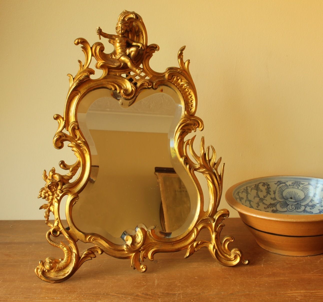 19th Century French Gold Gilt Bronze Rococo Style Cherub Easel Back Table Mirror. photo furniture