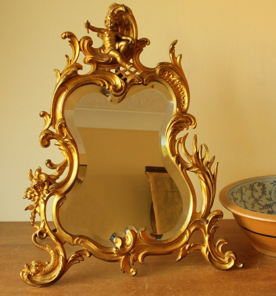 525.0 19th Century French Gold Gilt Bronze Rococo Style Cherub Easel Back Table Mirror. photo