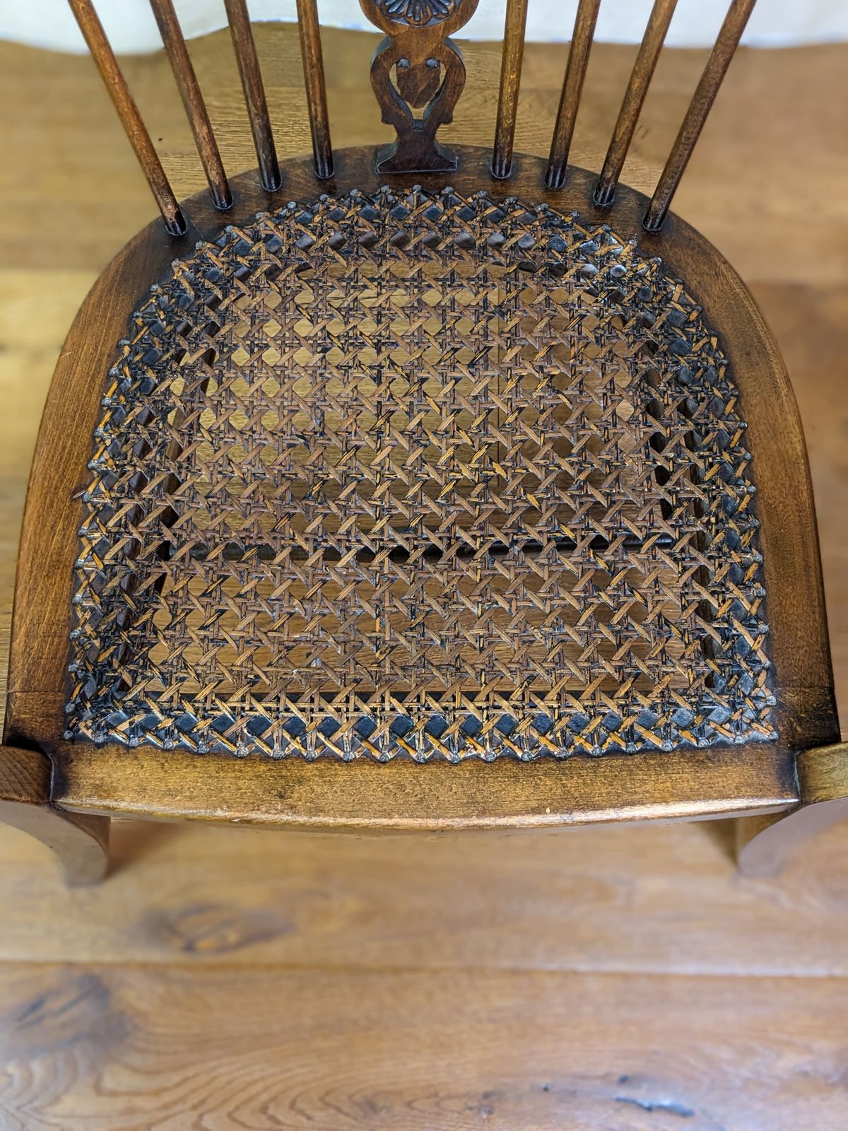 photo for sale Very Pretty Victorian Rattan Cane Bergere Tub Chair From Late 19th Century With Half Spindle Back And Pierced Central Splat