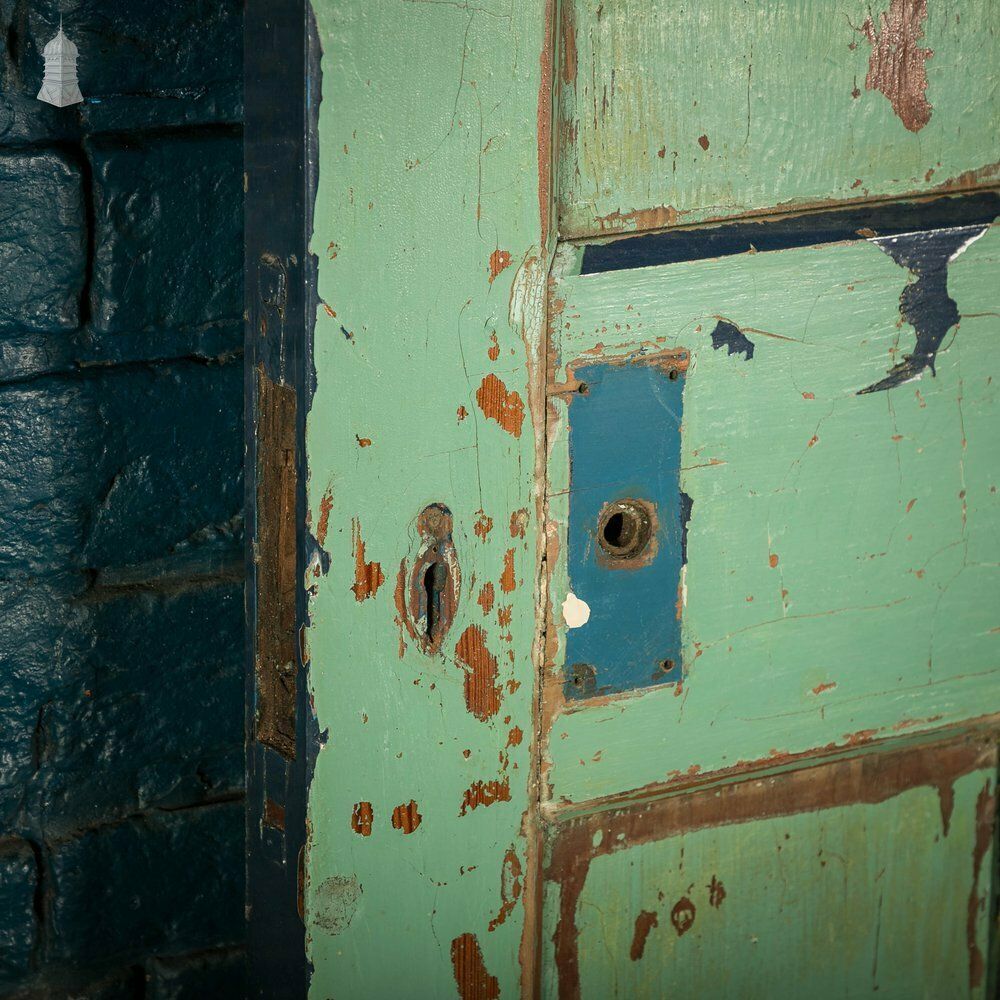 Pitch Pine Panelled Doors, Pair Of 4 Panel Doors With Green Distressed Paint Finish photo for sale
