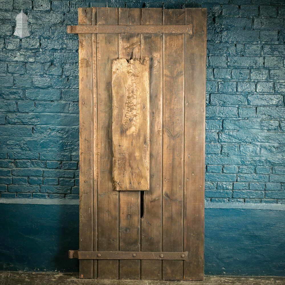 Rustic Pine Ledged And Braced Door With Large Iron Strap Hinges