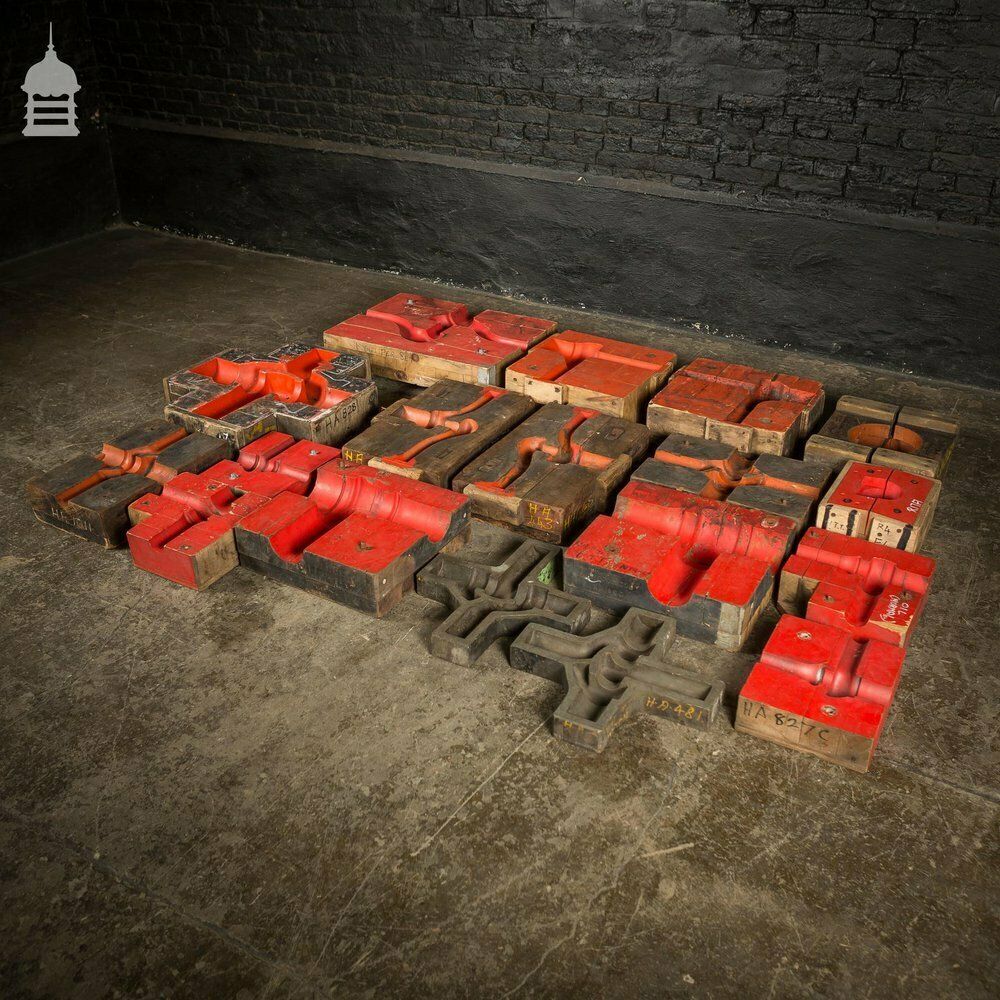 Collection Of 18 Red And Black Industrial Factory Moulds photo furniture