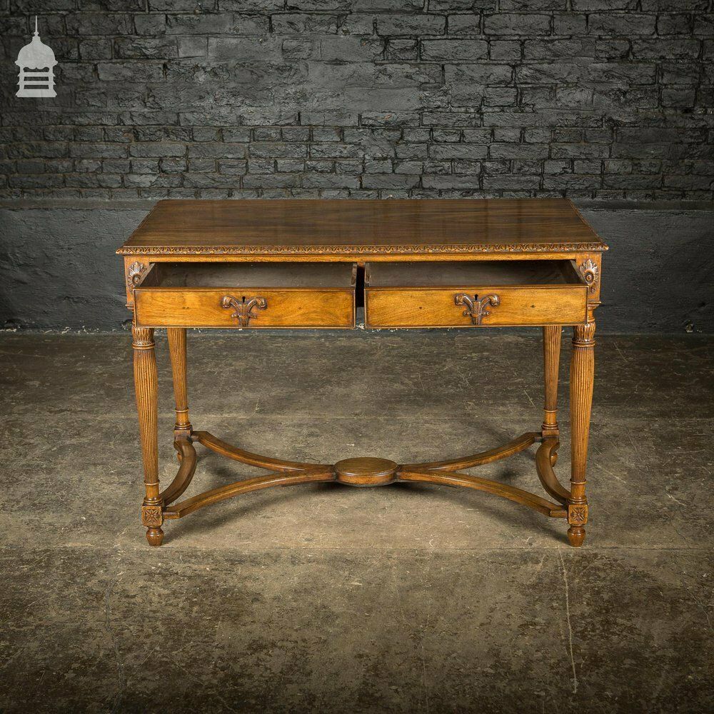 3300.0 A Fine Late 19th C Sheraton Style Writing Table With Carved Prince Of Wales Feathers Escutcheons And Elegant Mellon Fluted Legs. photo