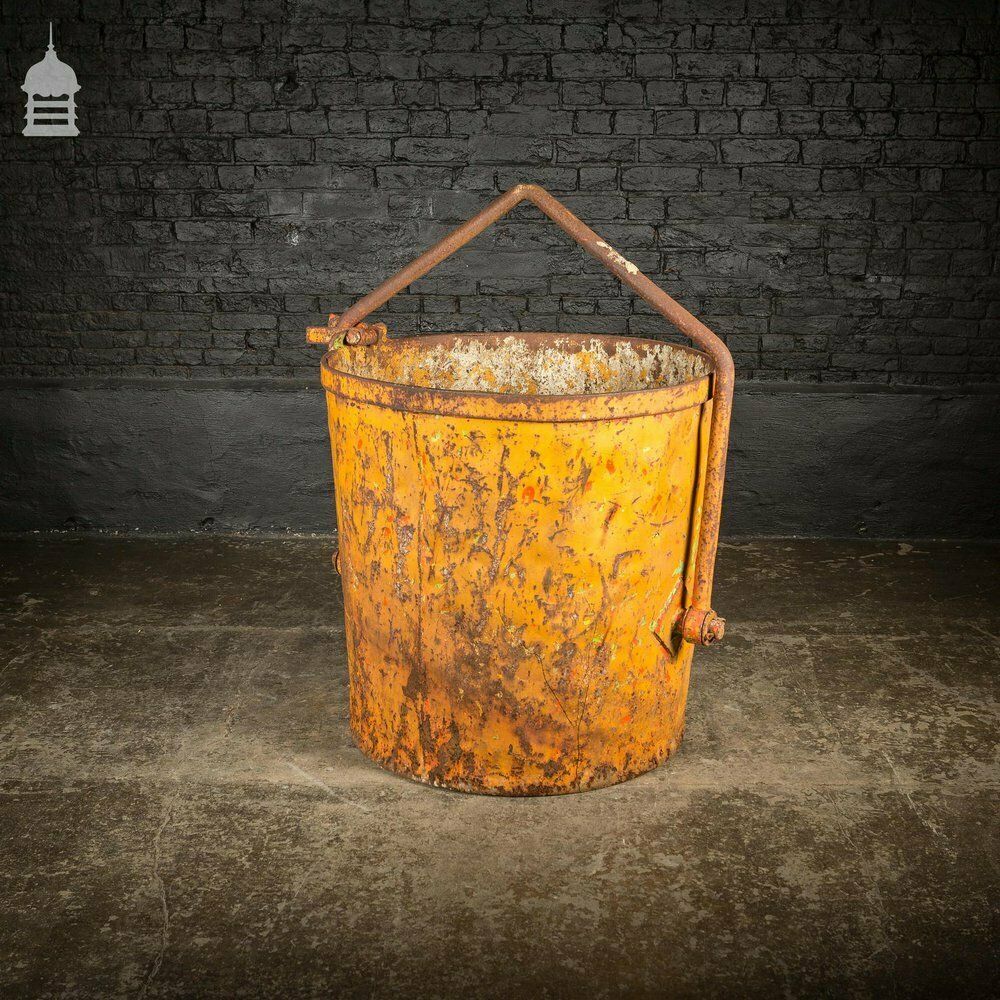photo vintage Large Industrial Yellow Painted Steel Barrel With Swing Handle