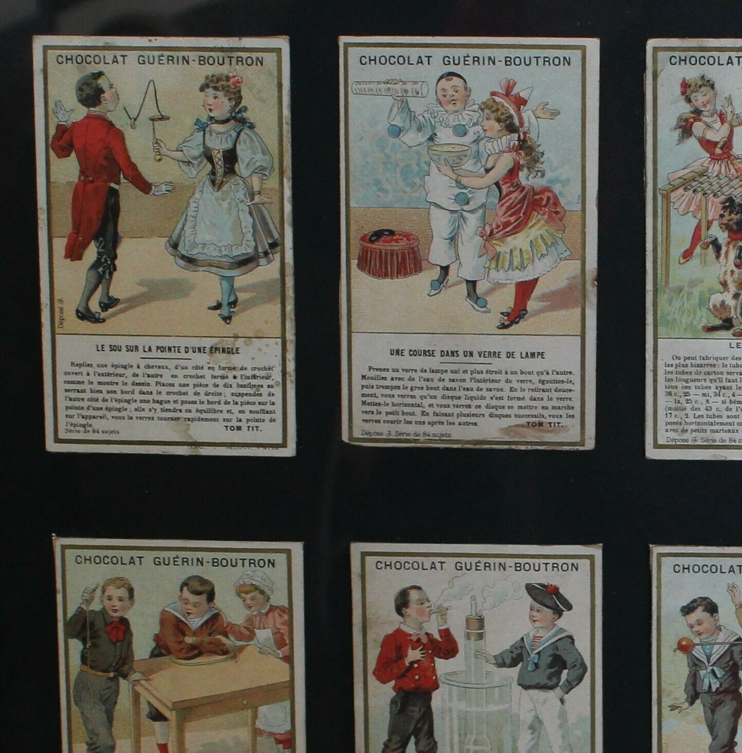 A Framed Set Of 6 Chocolat Guérin Boutron Trade Cards From The Tom Tit Series