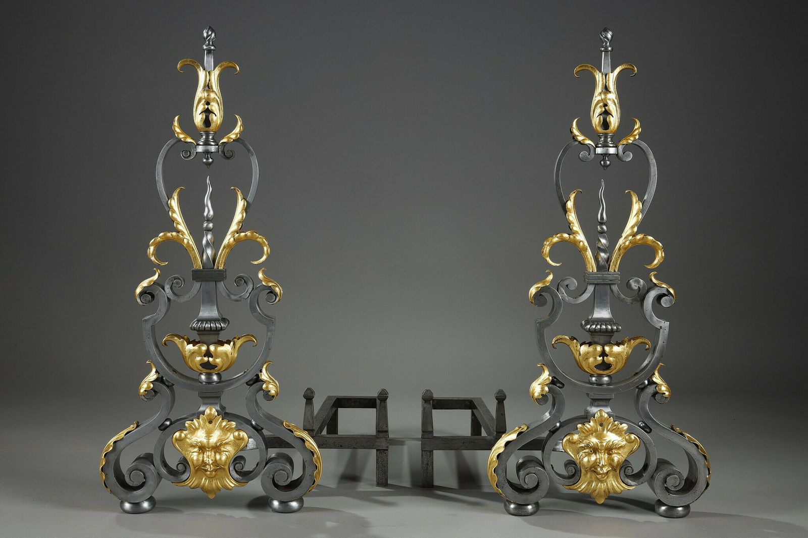 Pair Of Wrought Iron Landiers With Foliage, Mask And Scroll Decoration photo Home Decor