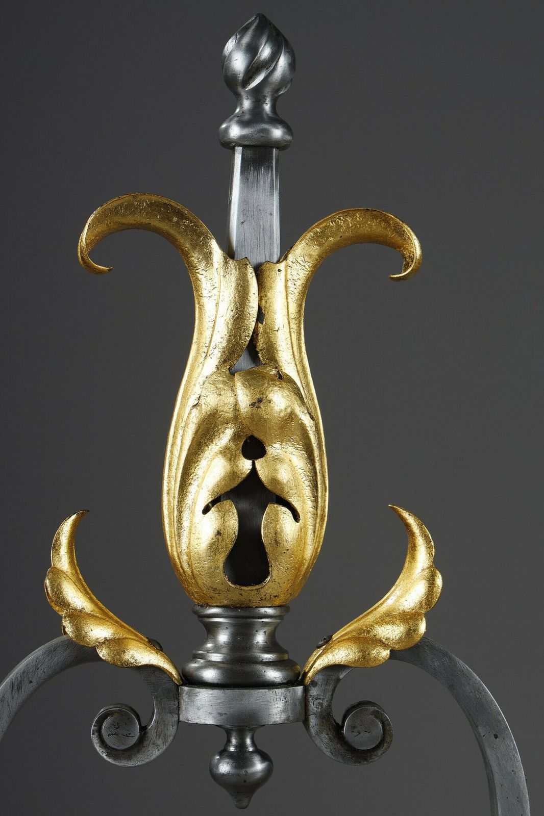 photo buy Pair Of Wrought Iron Landiers With Foliage, Mask And Scroll Decoration
