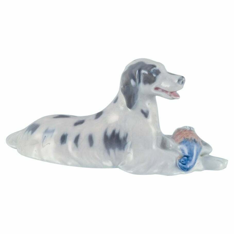 Royal Copenhagen, Porcelain Figurine Of A Setter With Pheasant.