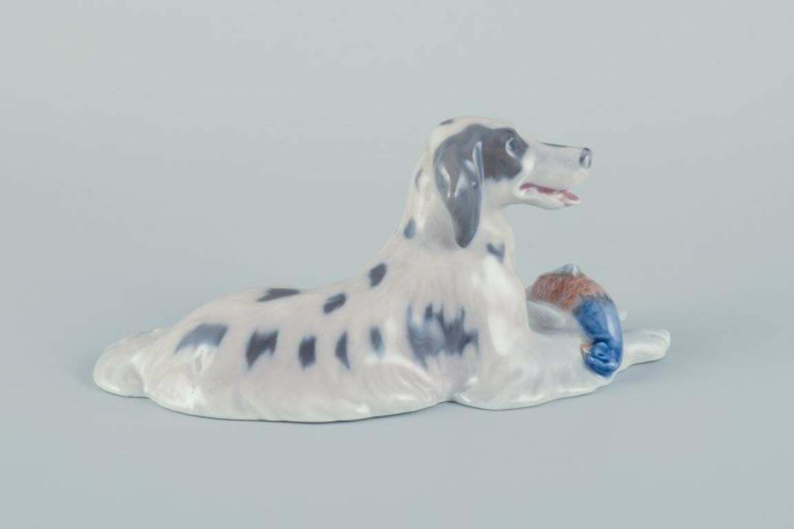 Royal Copenhagen, Porcelain Figurine Of A Setter With Pheasant. photo Home Decor