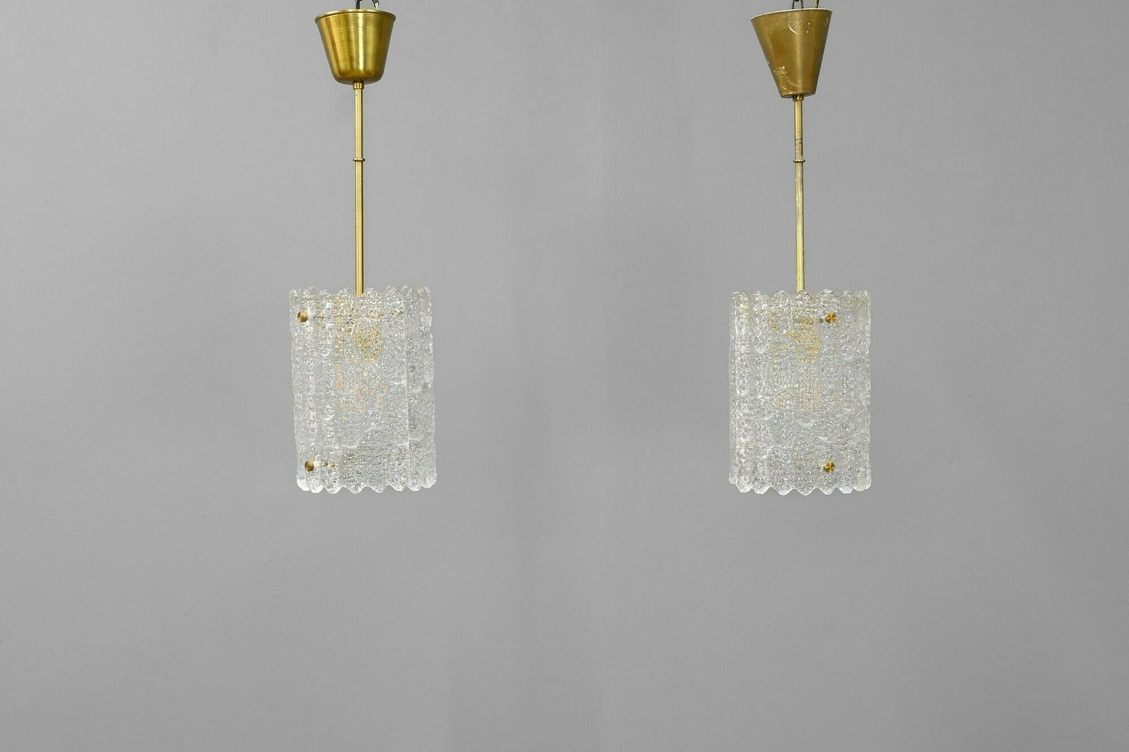 Pair Of Orrefors Pendant Lights