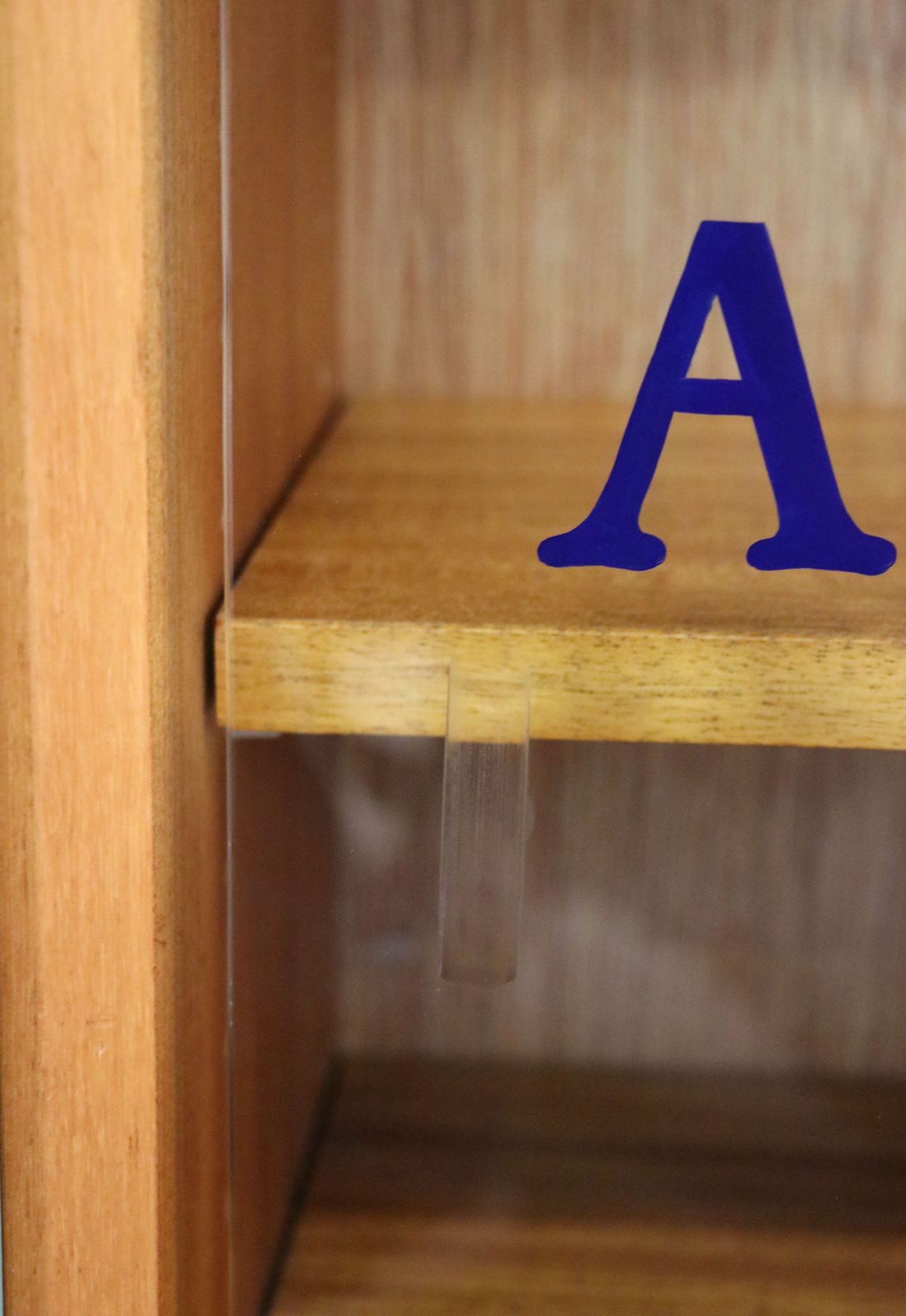 A Mid Century Gibbs Display Cabinet With The Anglia Television Logo. photo vintage