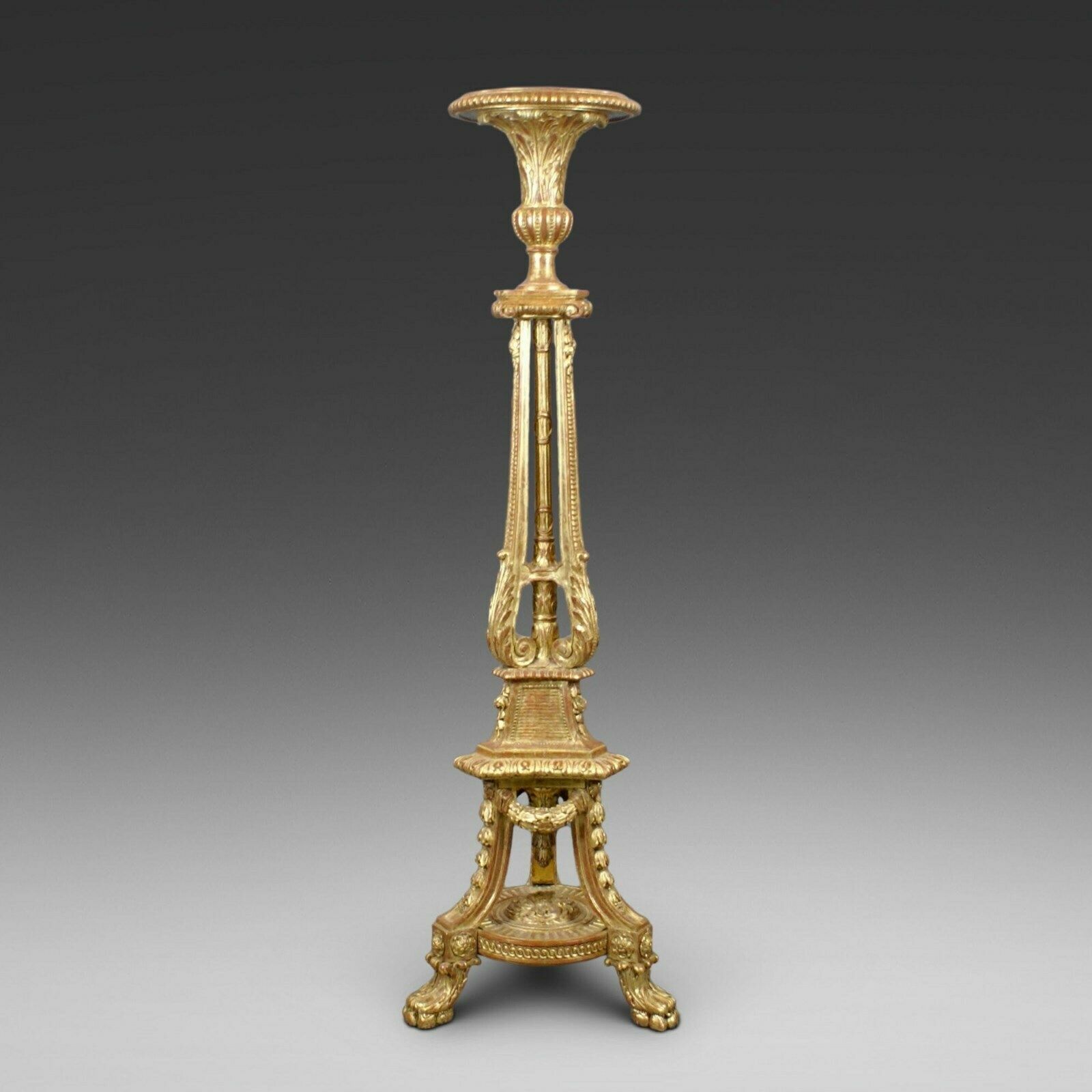 An 18th Century Style Carved Gilt Wood Torchere