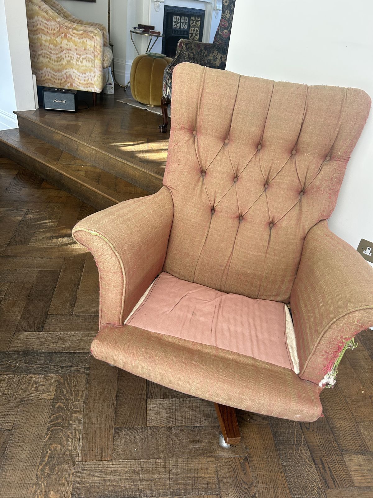 Swivel Wing Chair With A Textured Fabric In Burnt Amber Colour photo 250.0