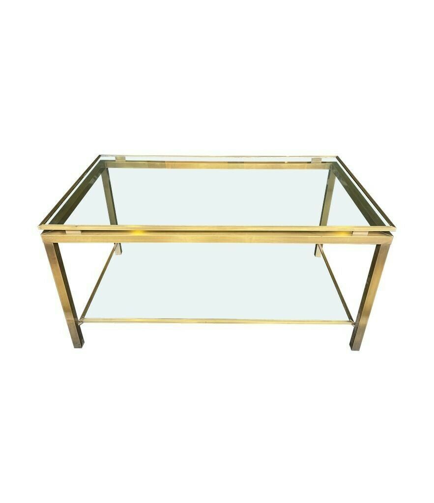A French 1970s Gilt Metal Two Tiered Coffee Table In The Style Of Guy Lefevre