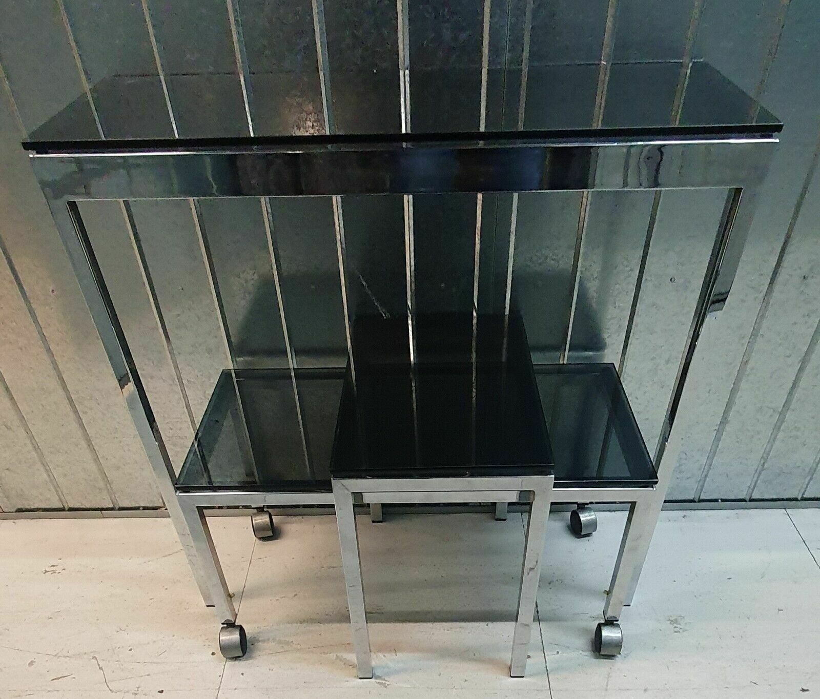 A Set Of 3 Chrome Tinted Glass Tables photo buy