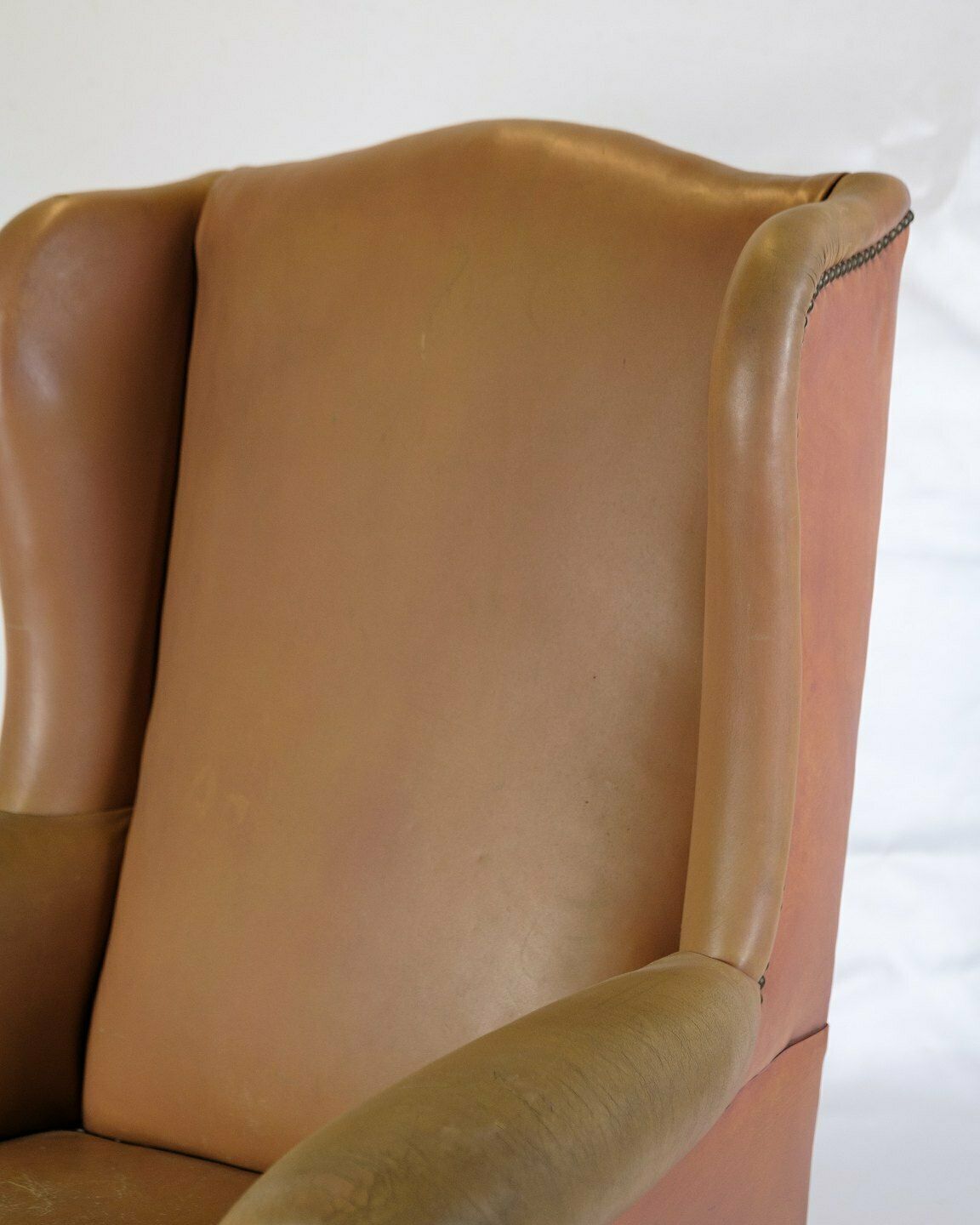 Antique High Ear Flap Chair  In Brown Studded Leather From 1920s photo furniture