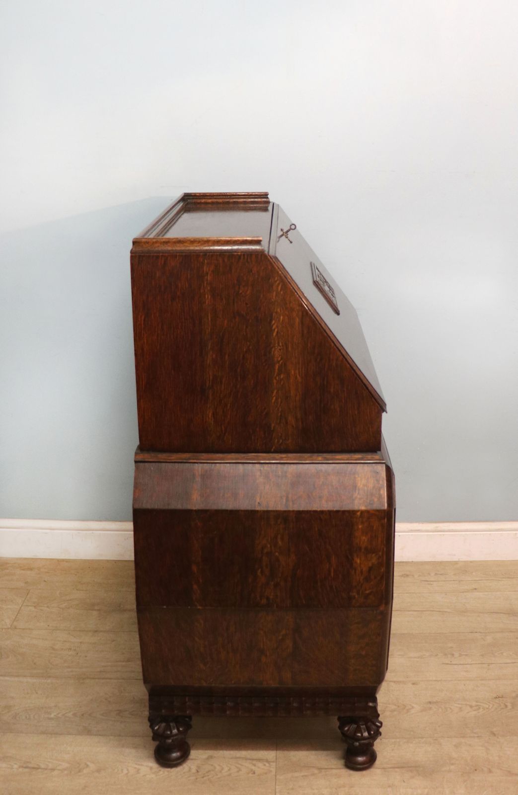 photo vintage A Most Unusually Configured Oak Veneered Bureau.