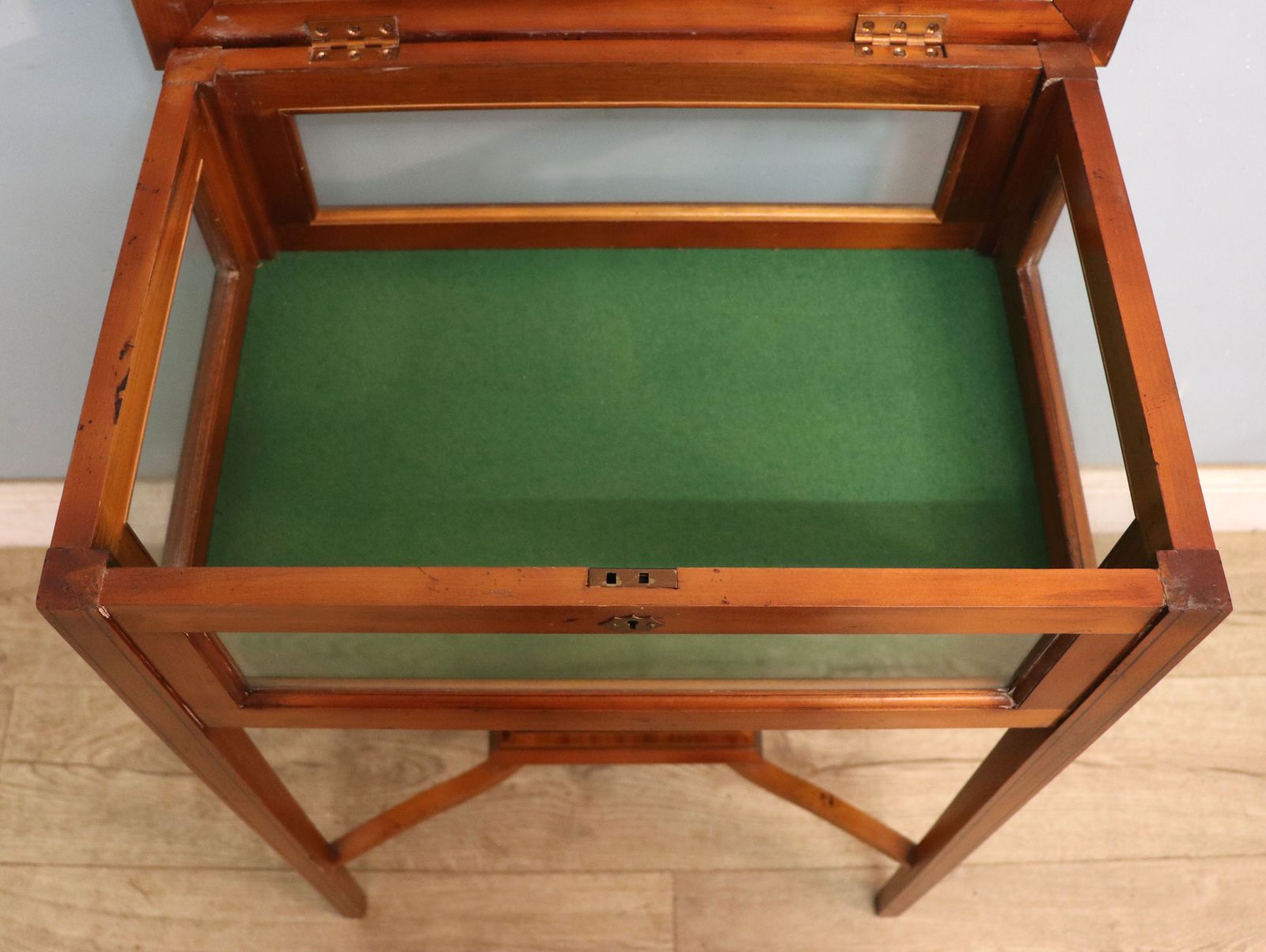 495.0 A Lovely Yew Wood Veneered Bijouterie Display Table, Later Sign Written For Breitling Watches. photo
