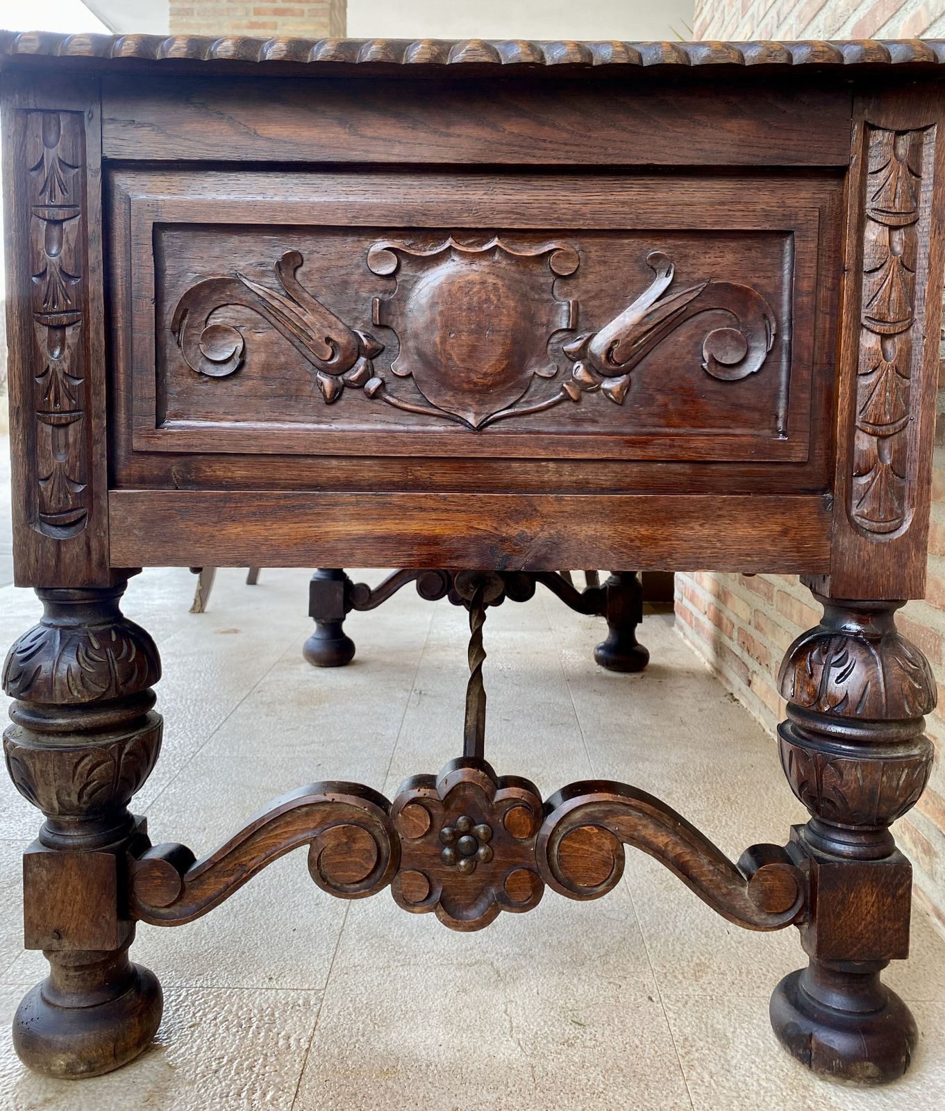19th Century French Renaissance Hand Carved Desk Or Writing Table With Carved Structure And Iron Stretcher photo buy