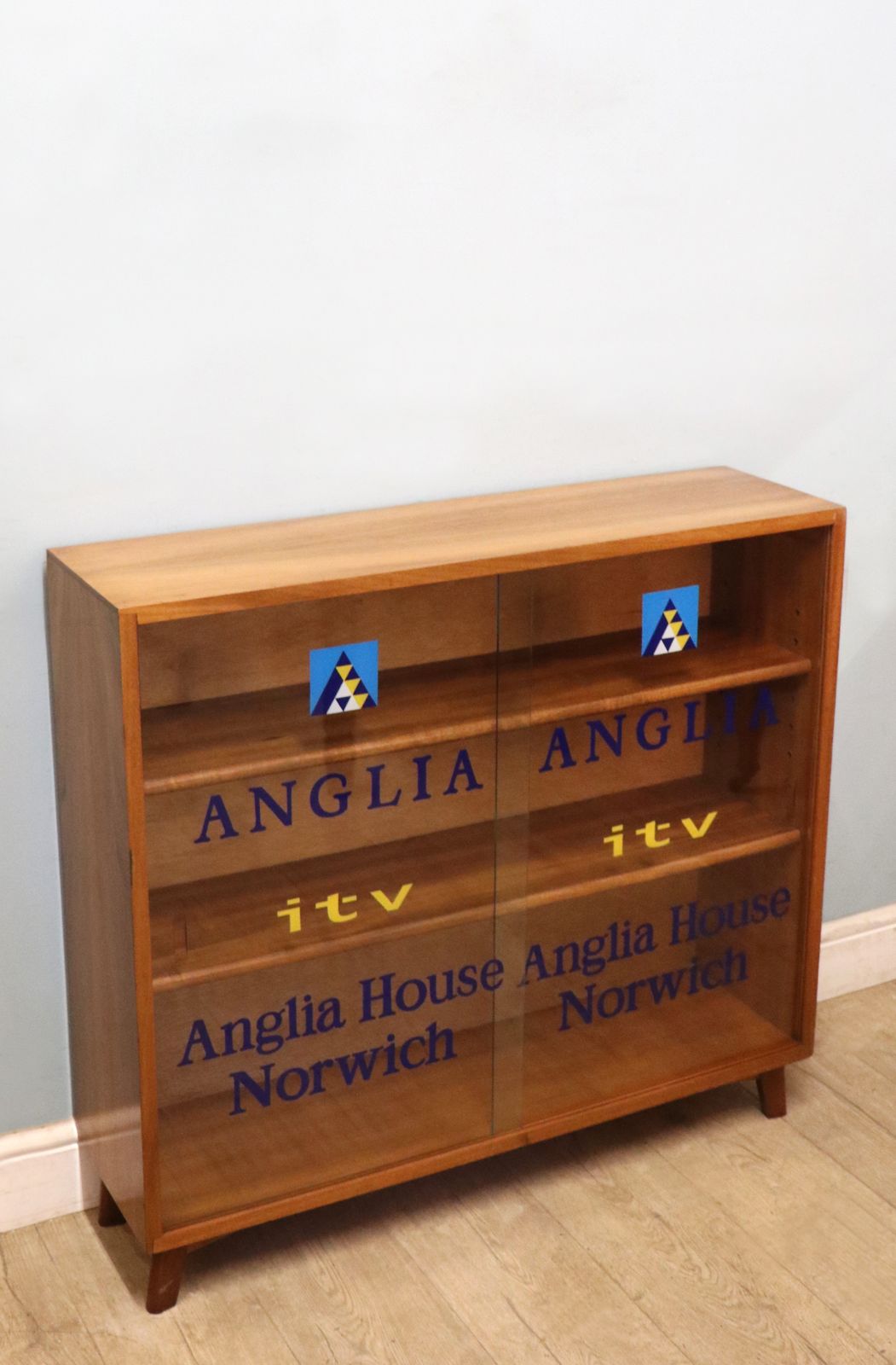 A Lovely Quality Mid Century Bookcase Cabinet,  Later Sign Written For Anglia Television. photo buy