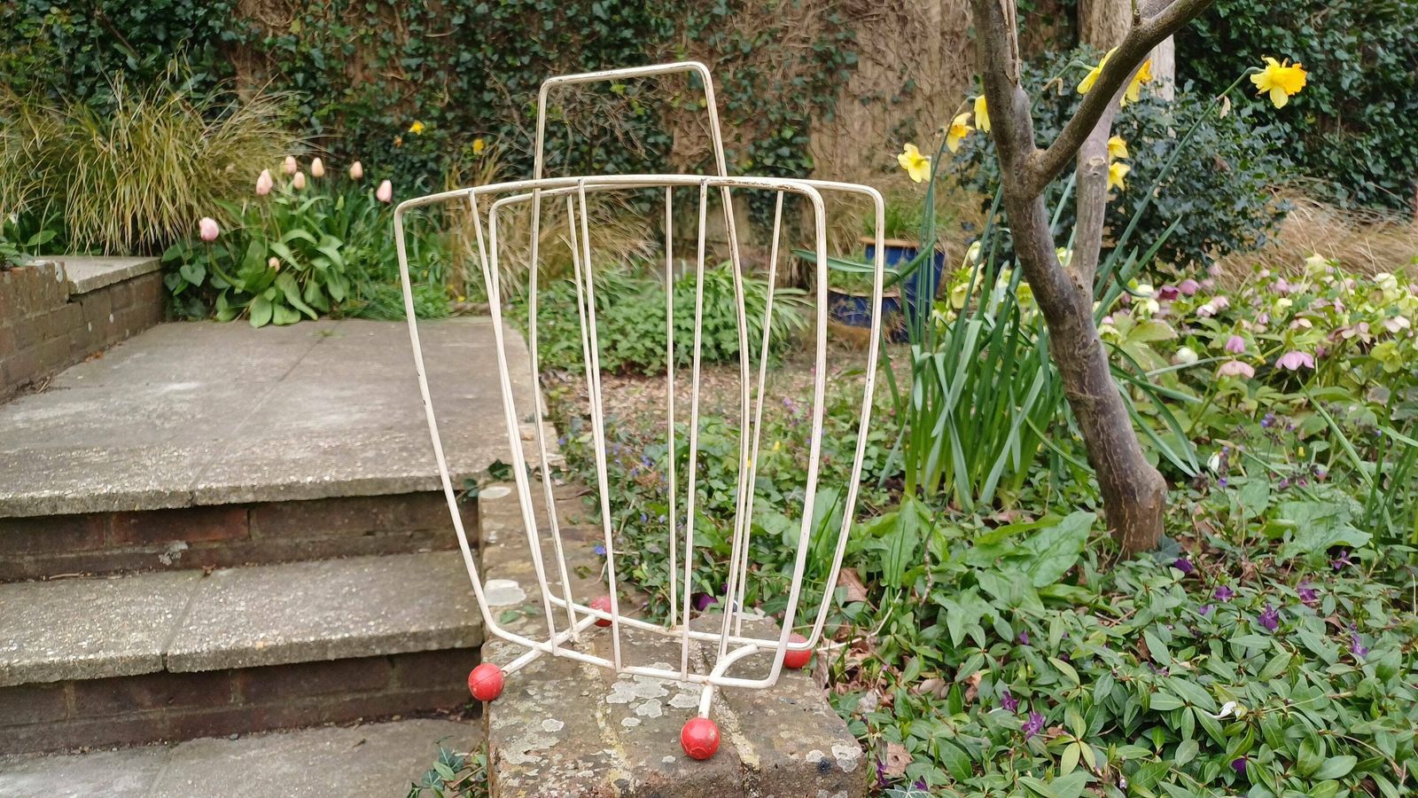 Vintage Retro White Metal Magazine Rack With Atomic Red Feet photo for sale