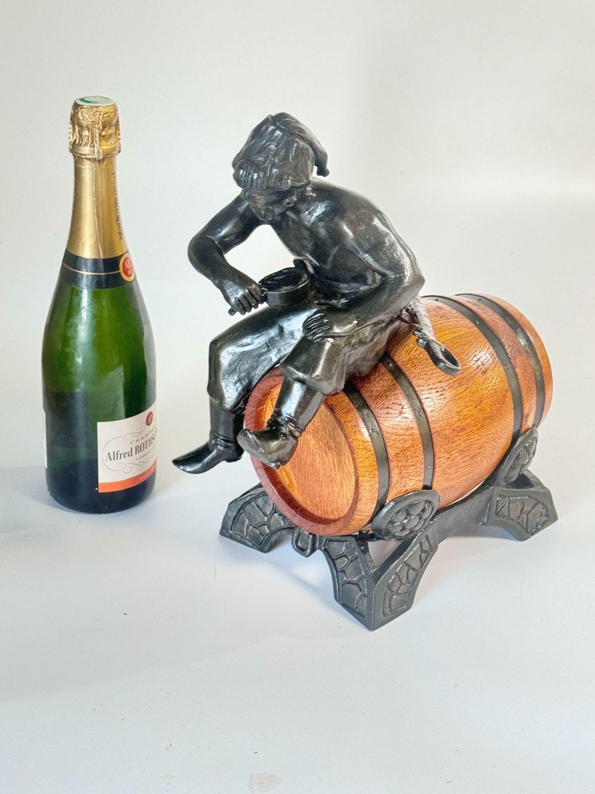Oak And Brass Sailor’s Rum Barrel With Bronze Sculpture Of A Russian Cossack photo furniture