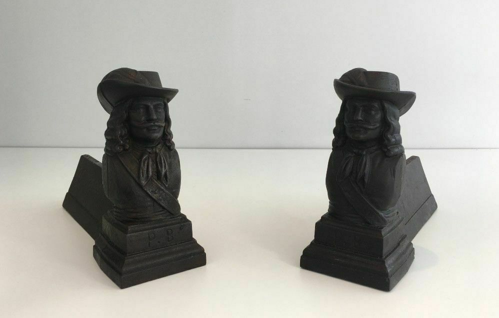 Pair Of Cast Iron Andirons With The Effigy Of A Musketeer