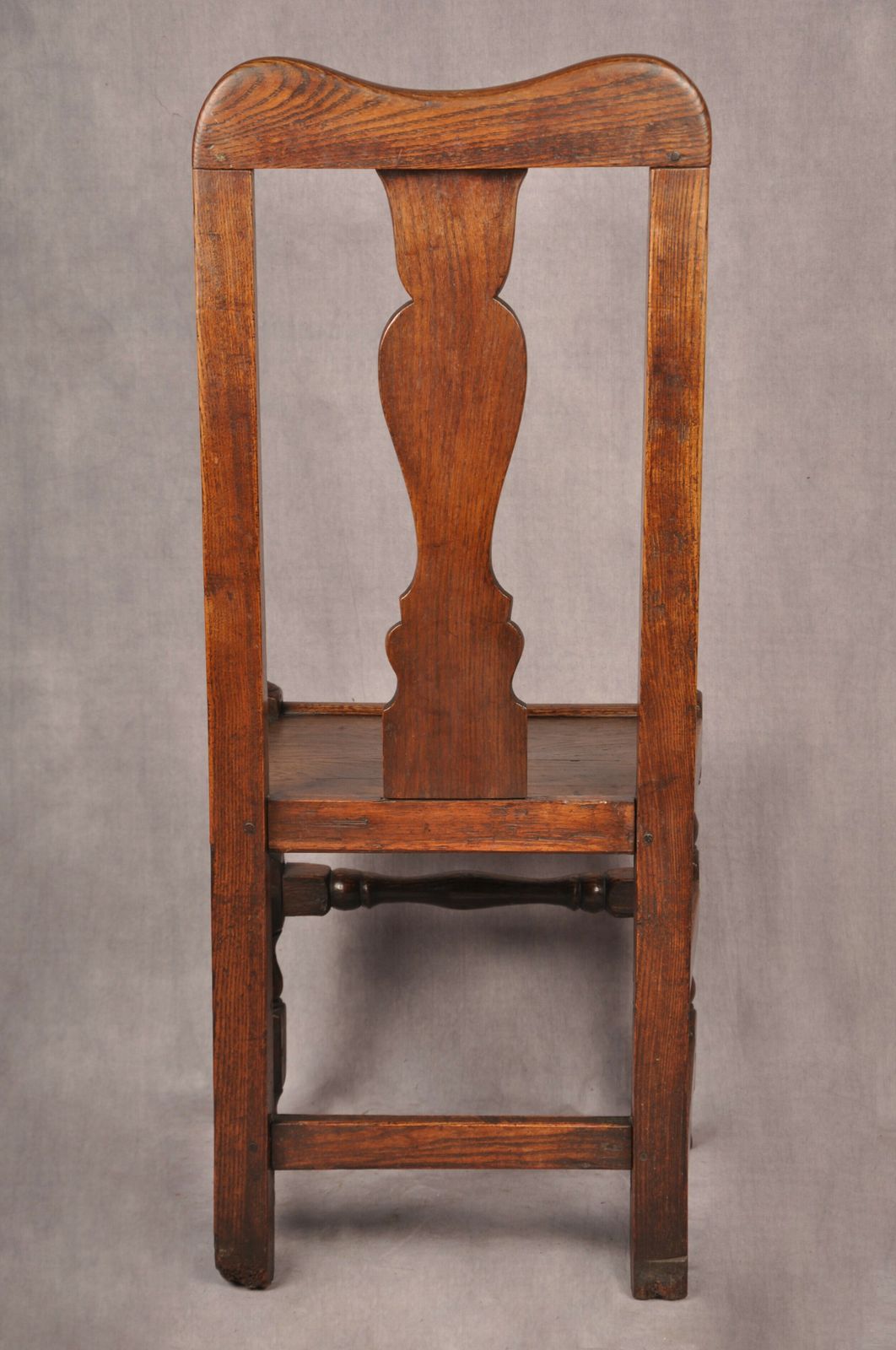 photo furniture A Set Of Four Queen Anne Oak & Elm Chairs