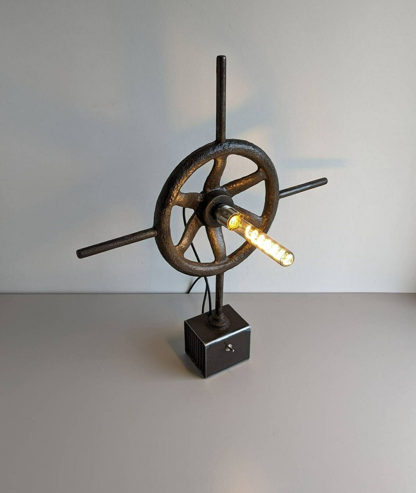photo furniture Vintage Industrial Ship's Wheel Gate Valve Upcycled Into Accent Table Lamp
