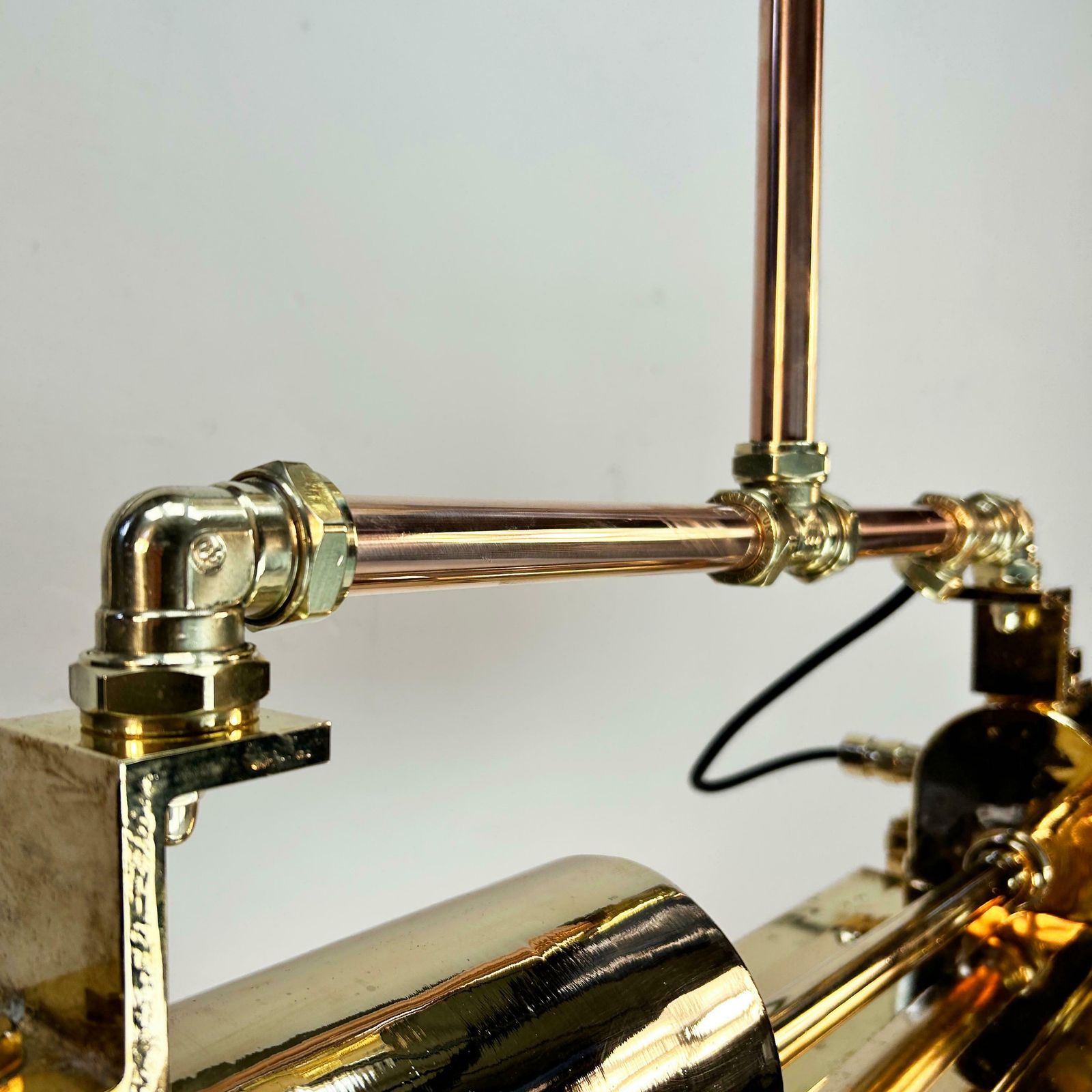 photo vintage 1970s Industrial Brass & Glass Flameproof Tube Light With Shades & Edison Lamps