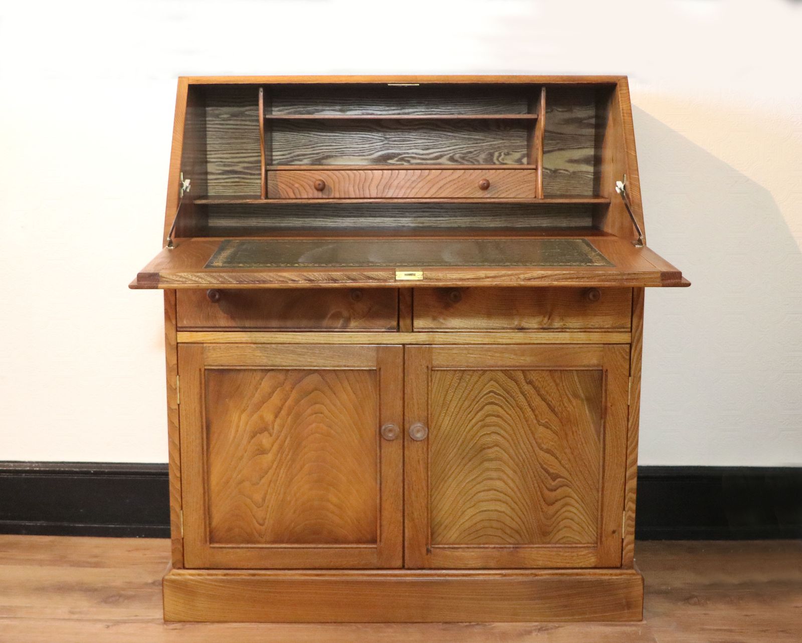 A Lovely Piece Of Ercol Elm Furniture From The Golden Dawn Range. photo Furniture