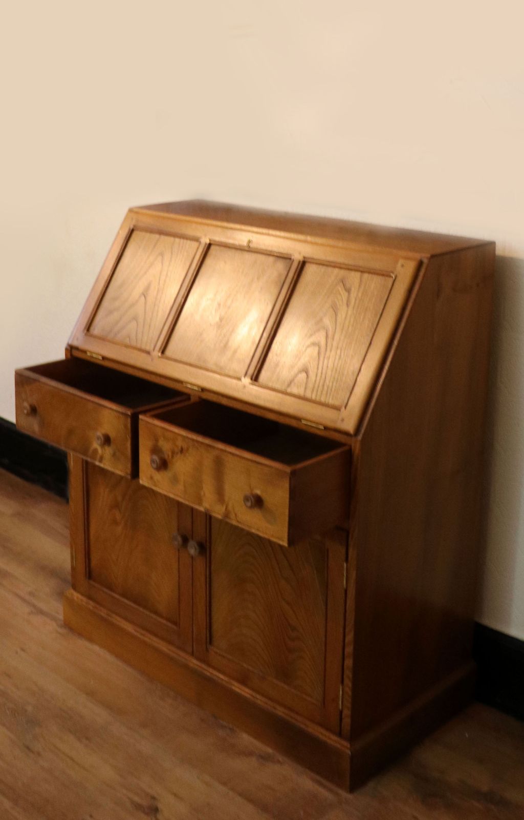 A Lovely Piece Of Ercol Elm Furniture From The Golden Dawn Range. photo buy