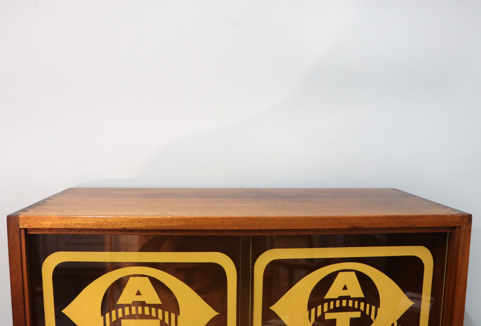photo vintage A Lovely Mid Century Display Cabinet Later Sign Written With The Emblems And Wording For Associated Television.
