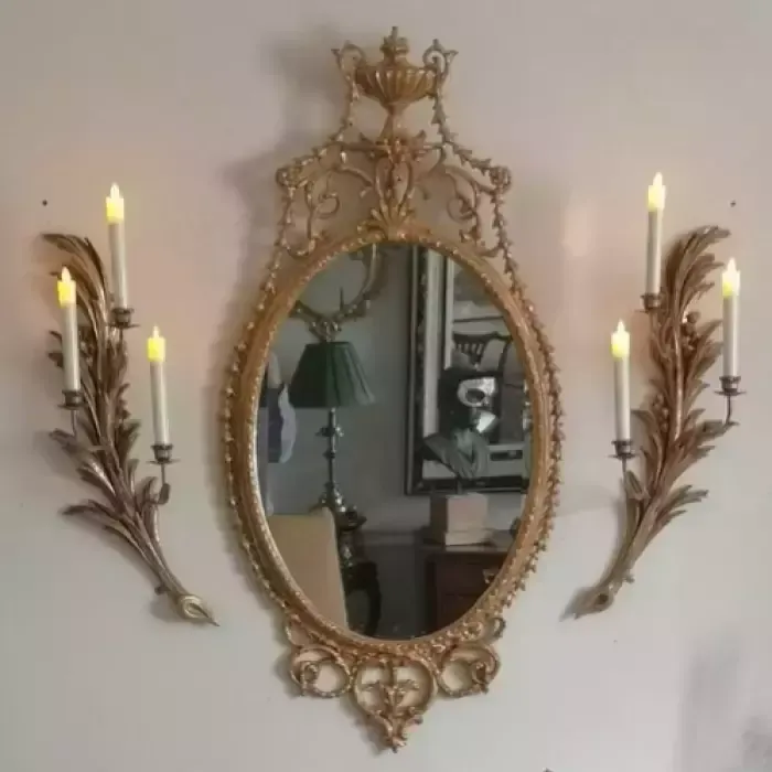 An Elegant George III Giltwood And Carton Pierre Oval Pier Glass, Late 18th Century photo for sale