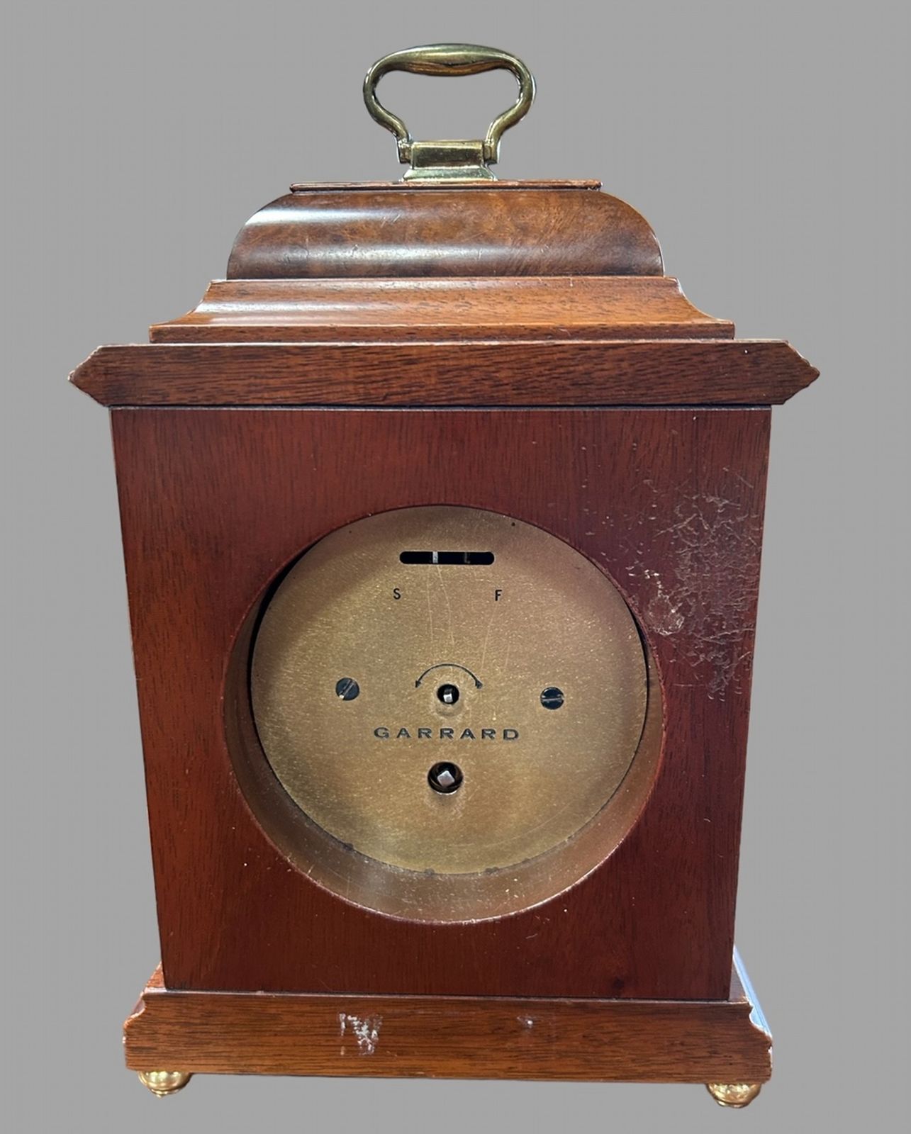 A Garrard Mantlepiece Clock photo furniture