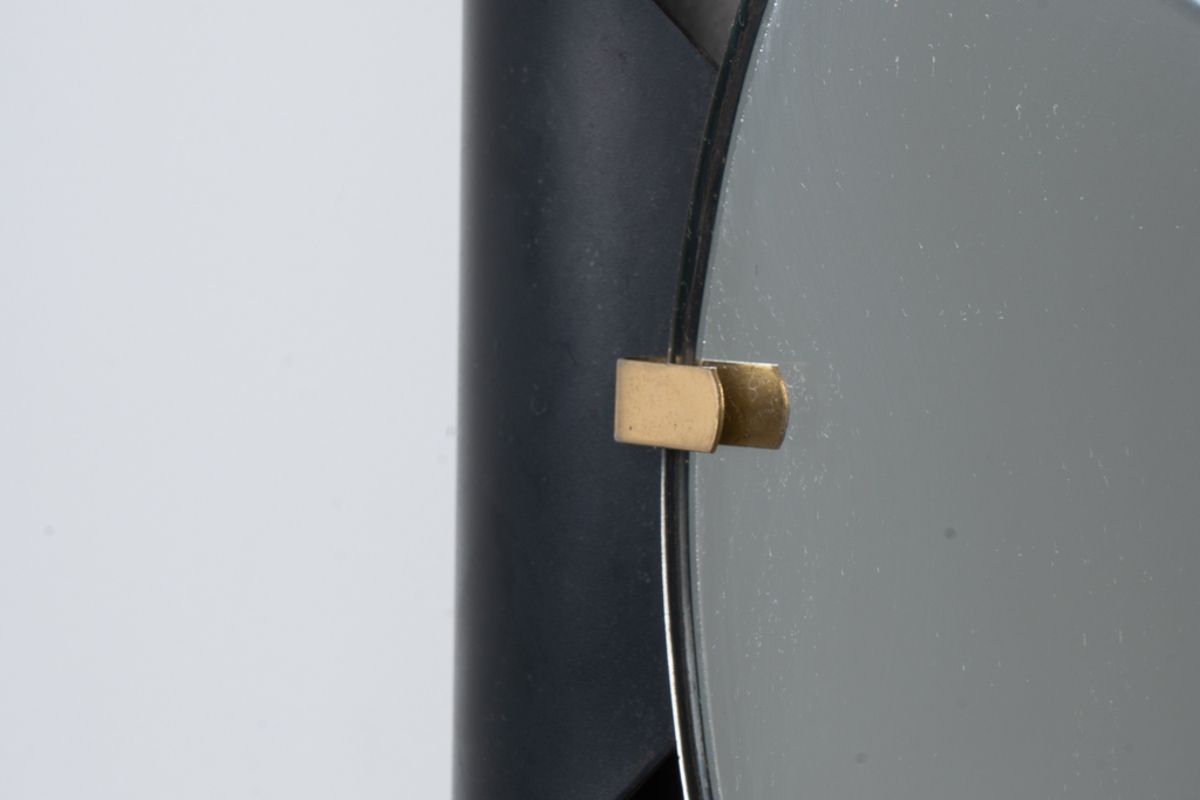 Mirror In Curved Metal And Golden Brass. 1970s. photo furniture