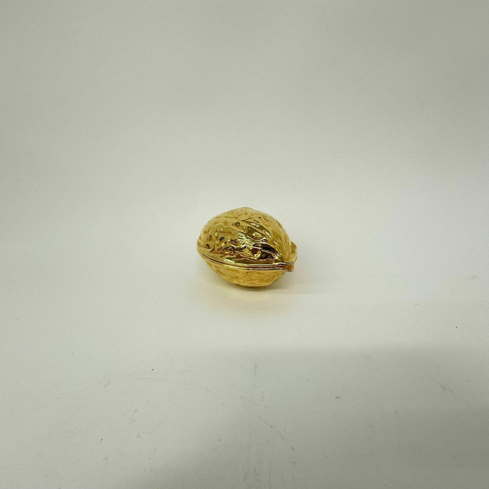 186.0 Vintage Gold Walnut Shaped Nut Cracker , 1970’s photo