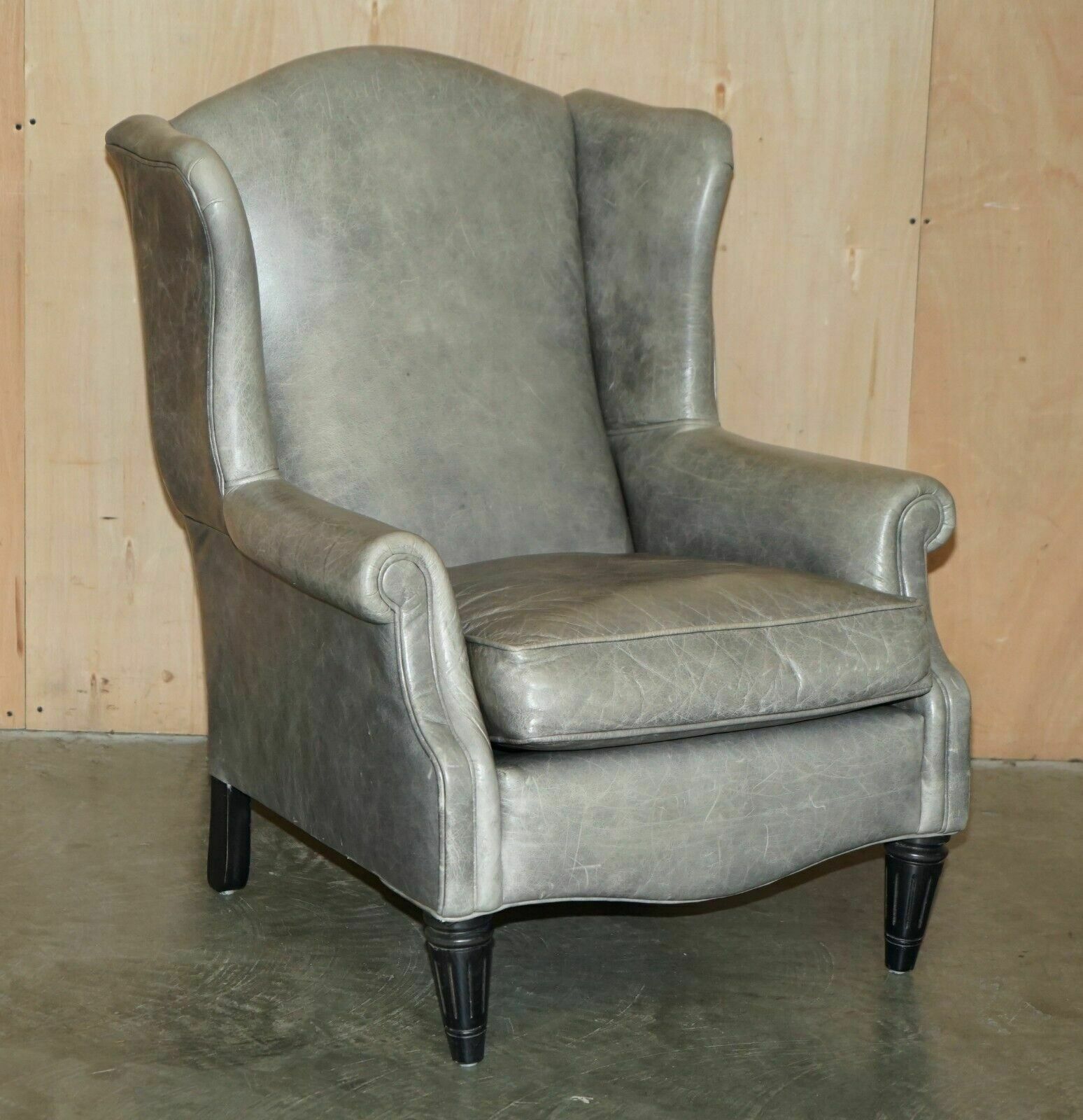 photo buy Luxury Pair Of Contemporary Grey Blue Leather Wingback Armchairs Ebonised Legs