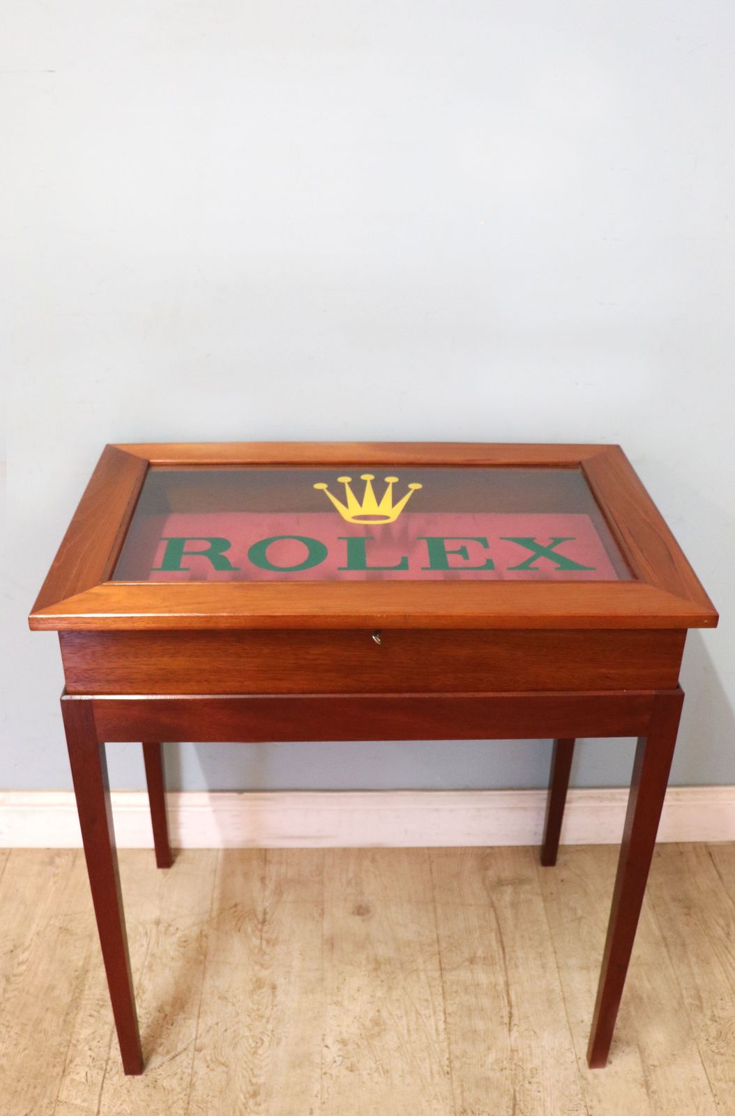 A Superb Bijouterie Display Table, Hand Sign Written With The Famous Rolex Watch Emblem.